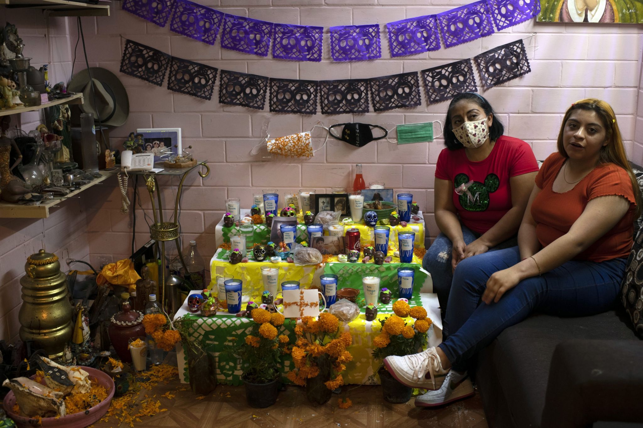 Isela Hernandez is one of the cofounders of Makalipt, a women's group from Tepito. Here she can be seen at the altar she has made.