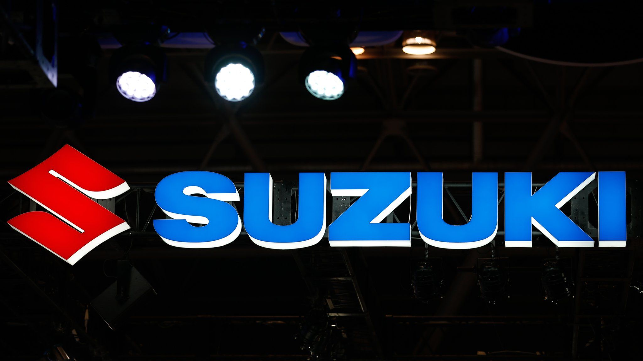 Suzuki logo at a car show