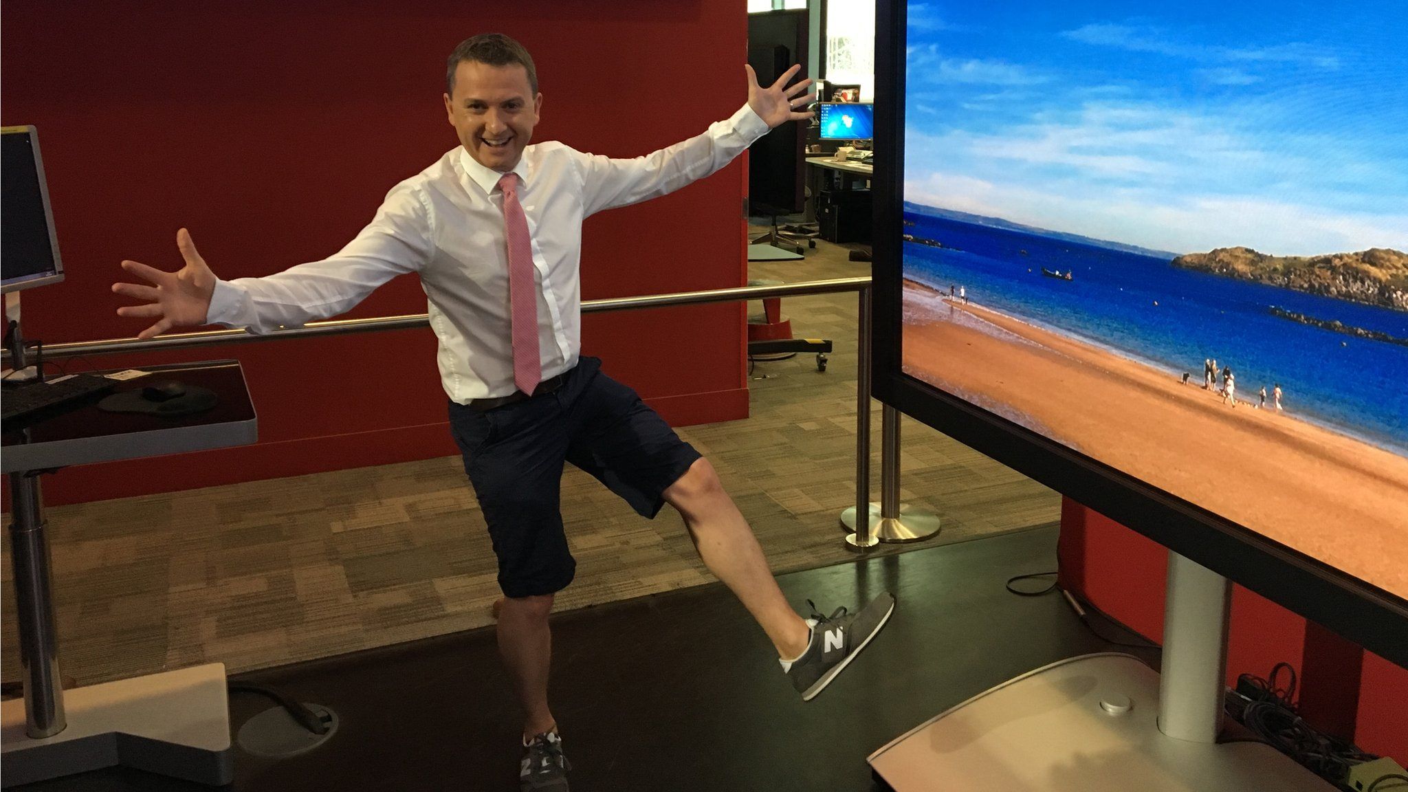 BBC Weather presenter Matt Taylor turns up to work in shorts during the UK heatwave