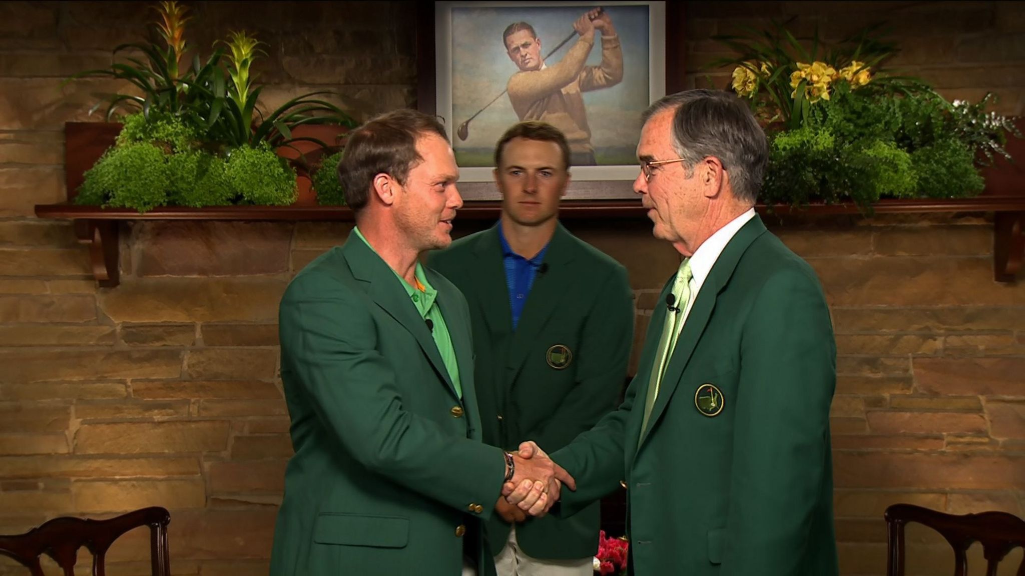Danny Willett is presented with the Green Jacket