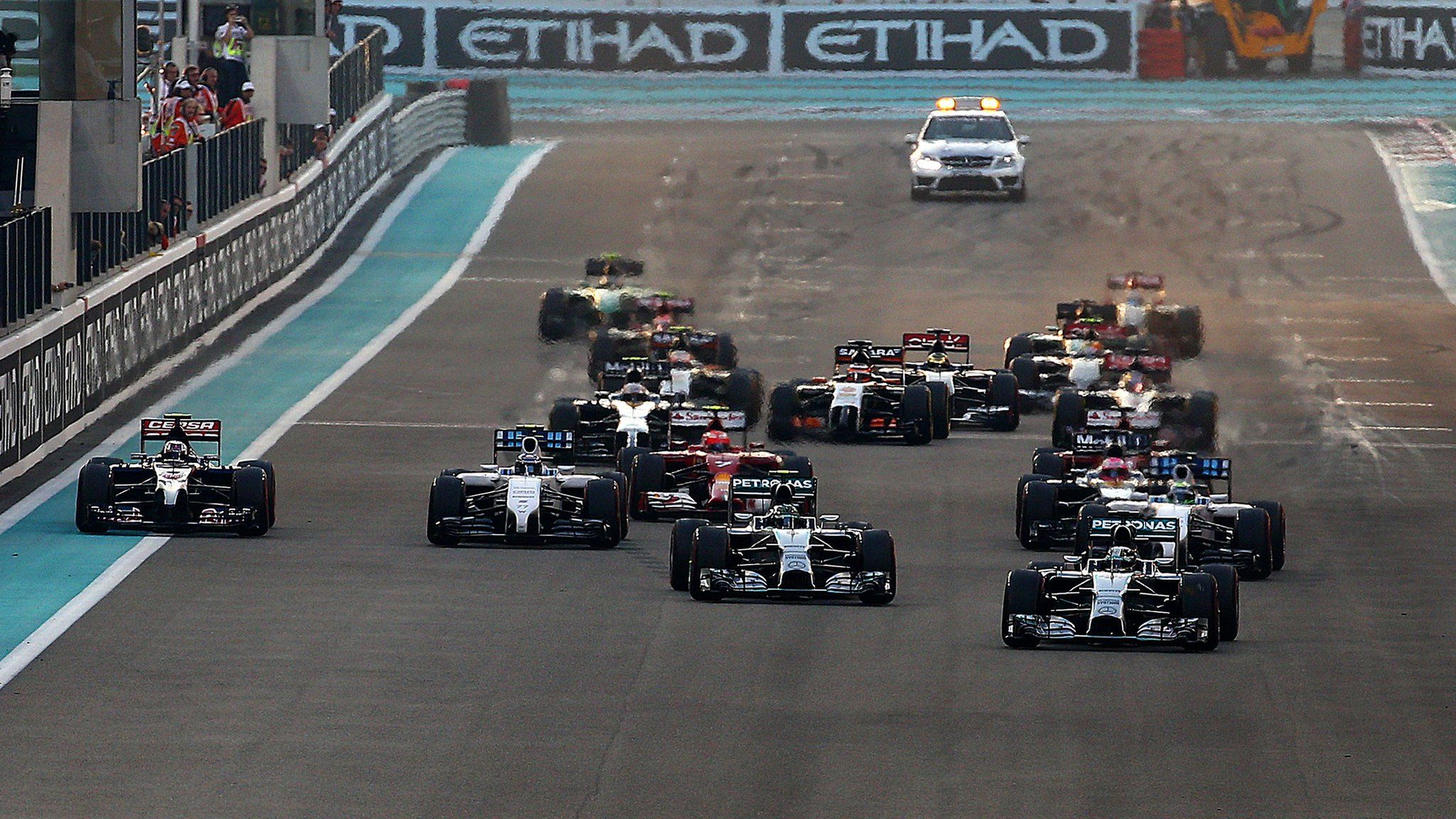 Formula 1 cars line up on the grid