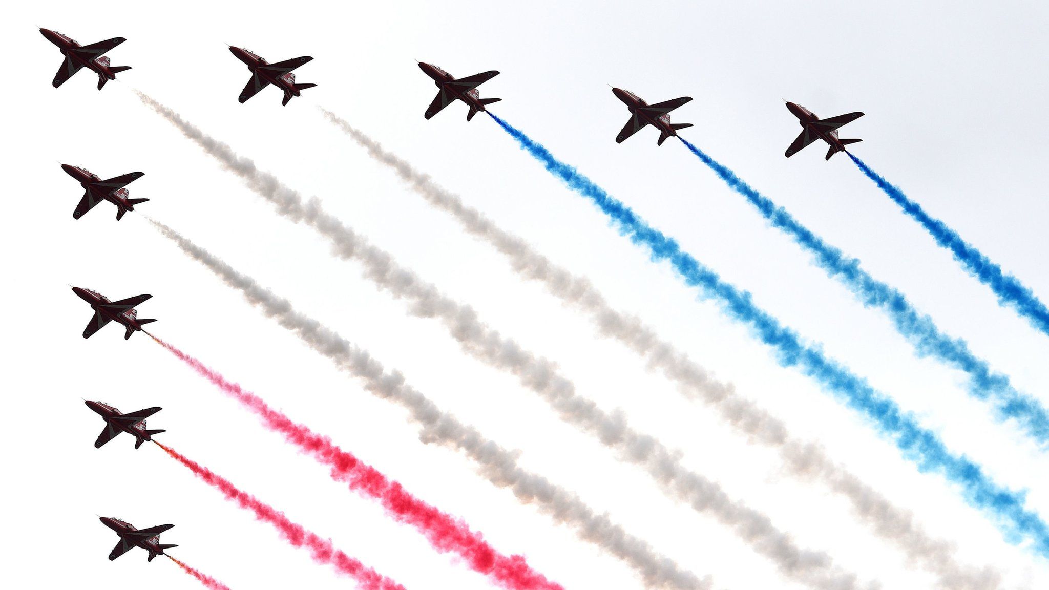 Red Arrows flying over Buckingham Palace, London in the Royal Air Force 100 flypast to mark the RAF's centenary.