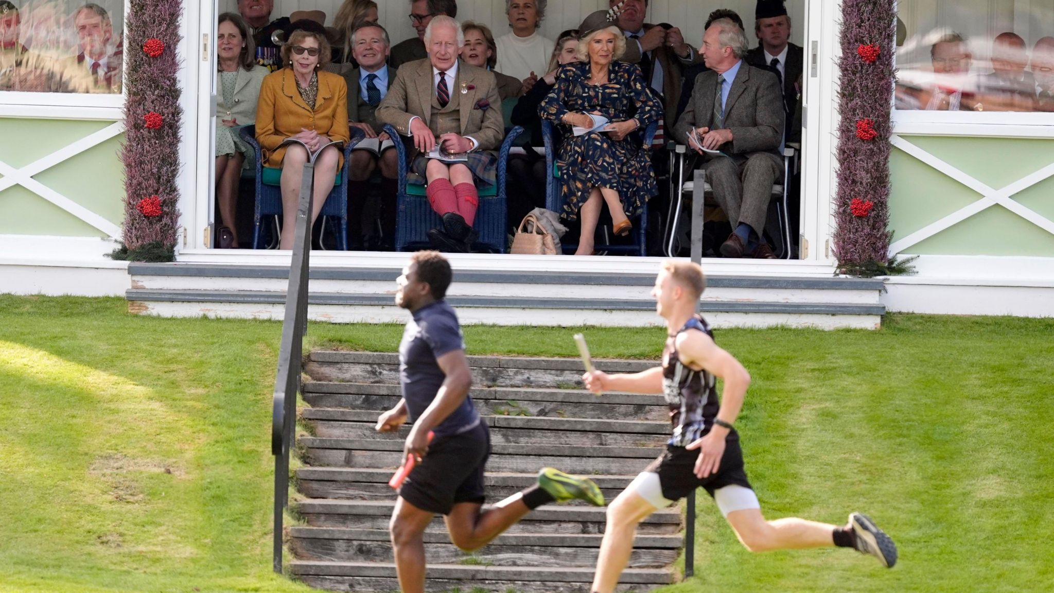 King Charles and Queen Camilla watching the games