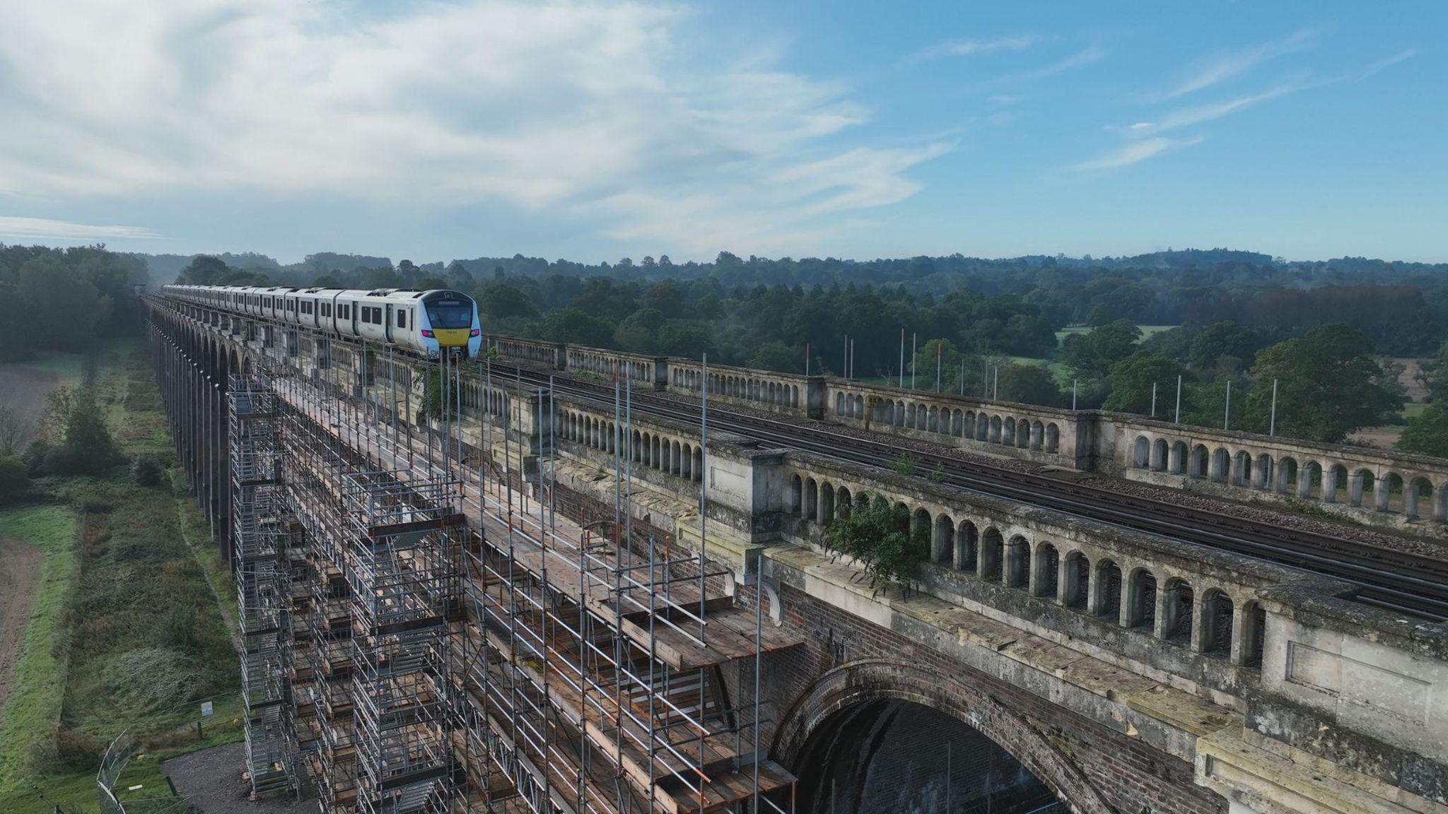 A train crossing Ouse Valley Viaduct