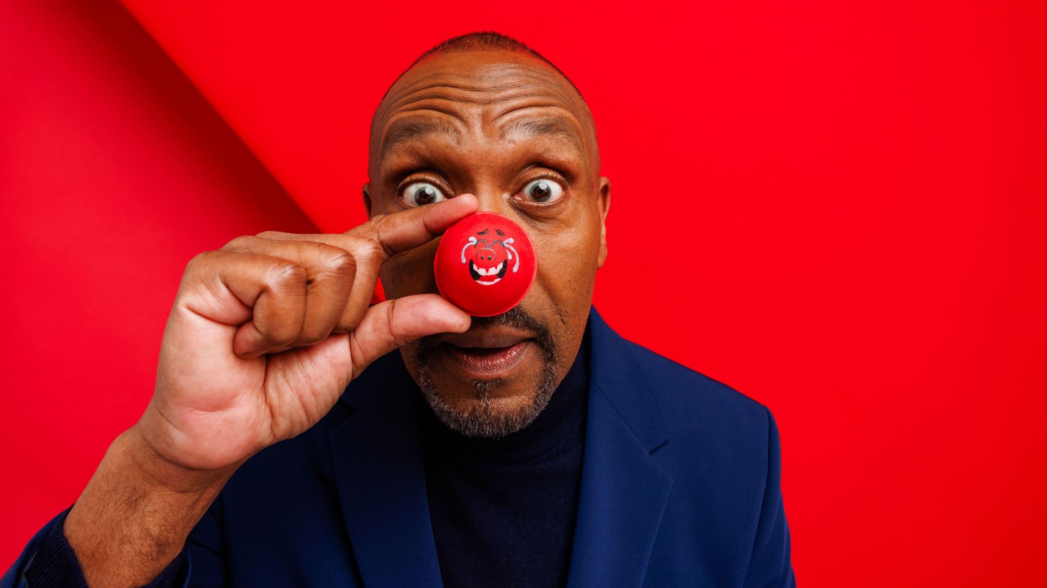 Sir Lenny Henry with a red nose