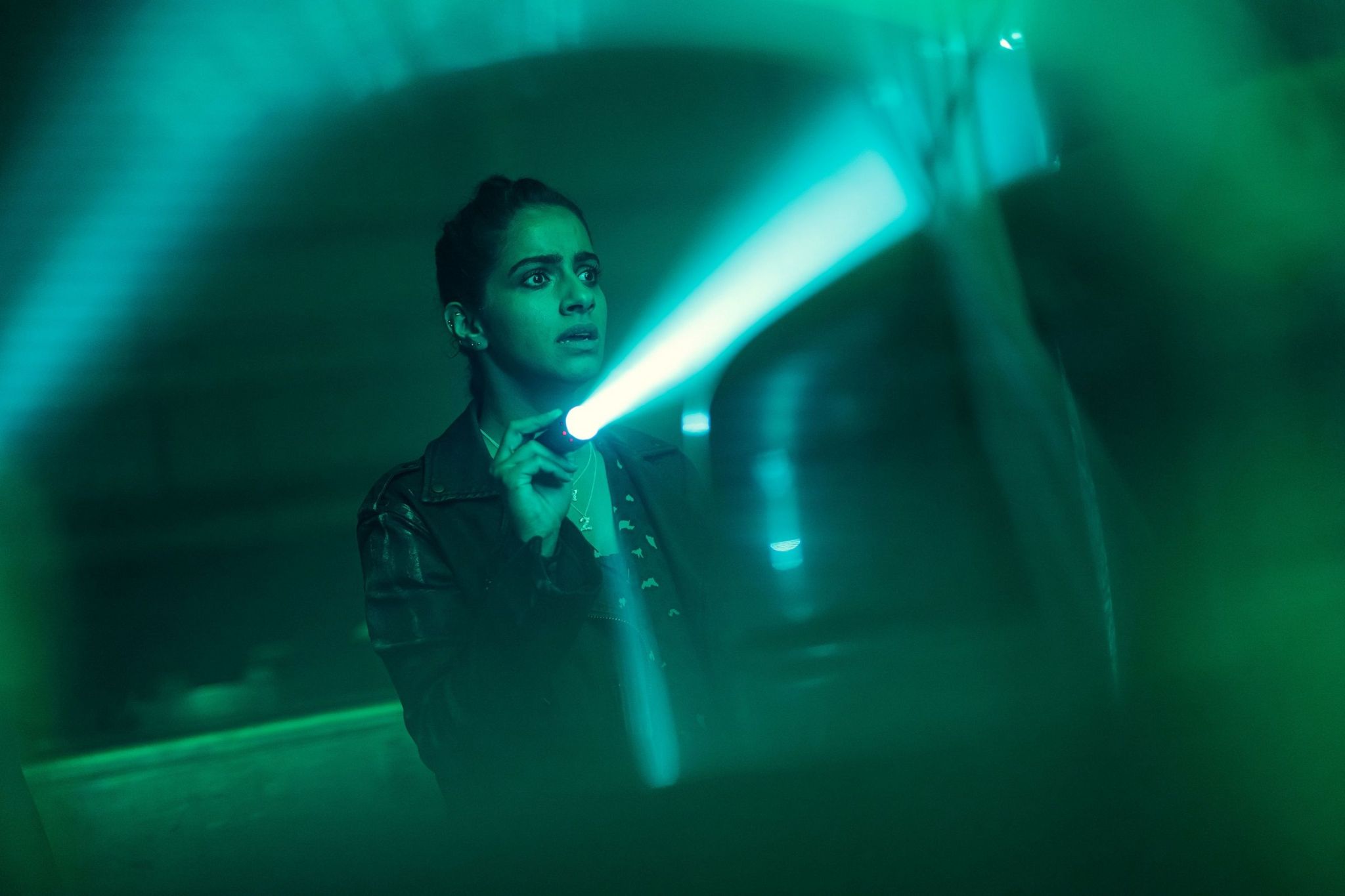 Mandip Gill (Yasmin Khan) investigating the whereabouts of The Doctor in Revolution of the Daleks (2021)