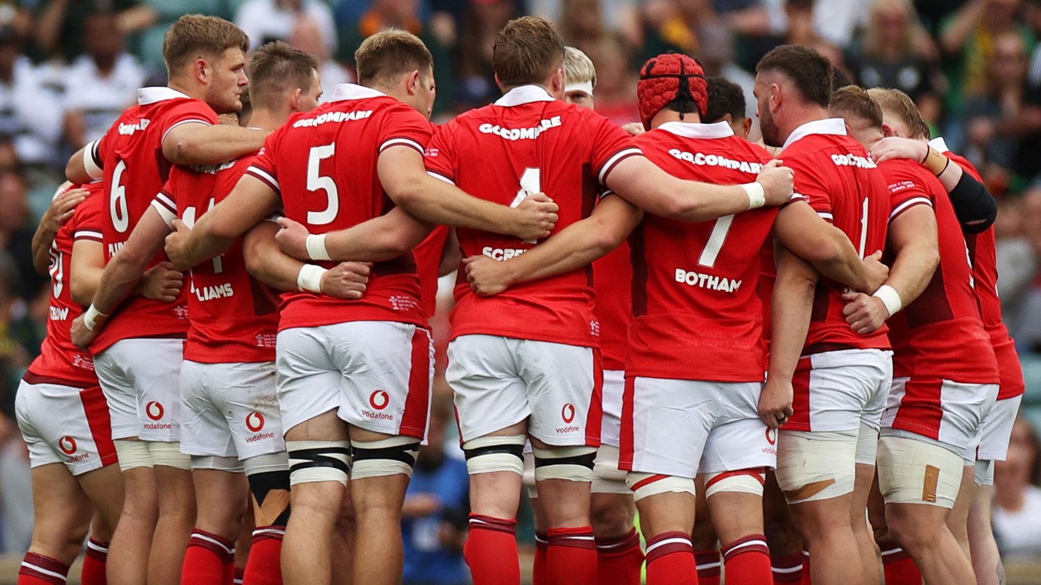 Wales players in a huddle against South Africa