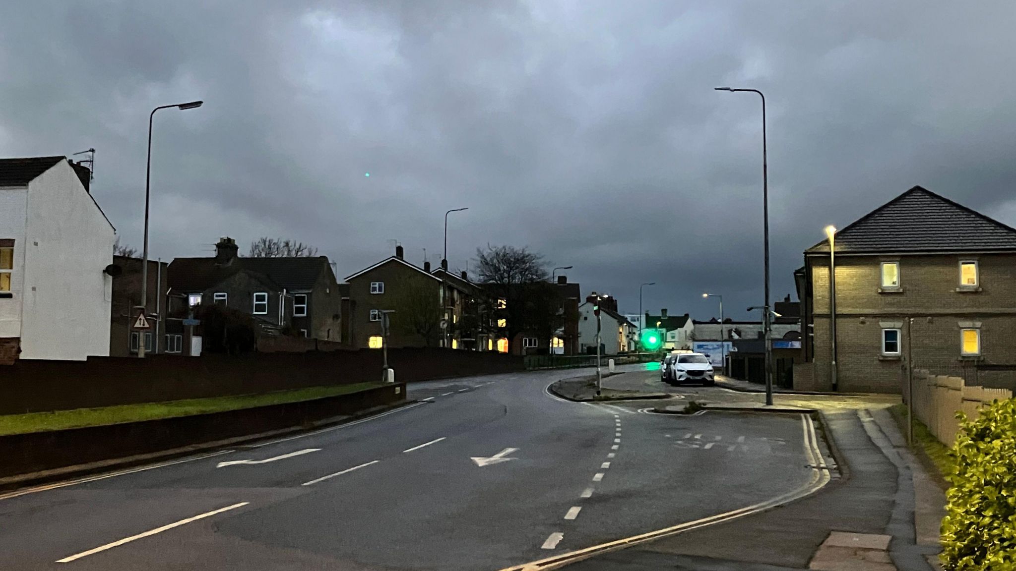 A street scene at dusk in Lowestoft showing many street lights not working