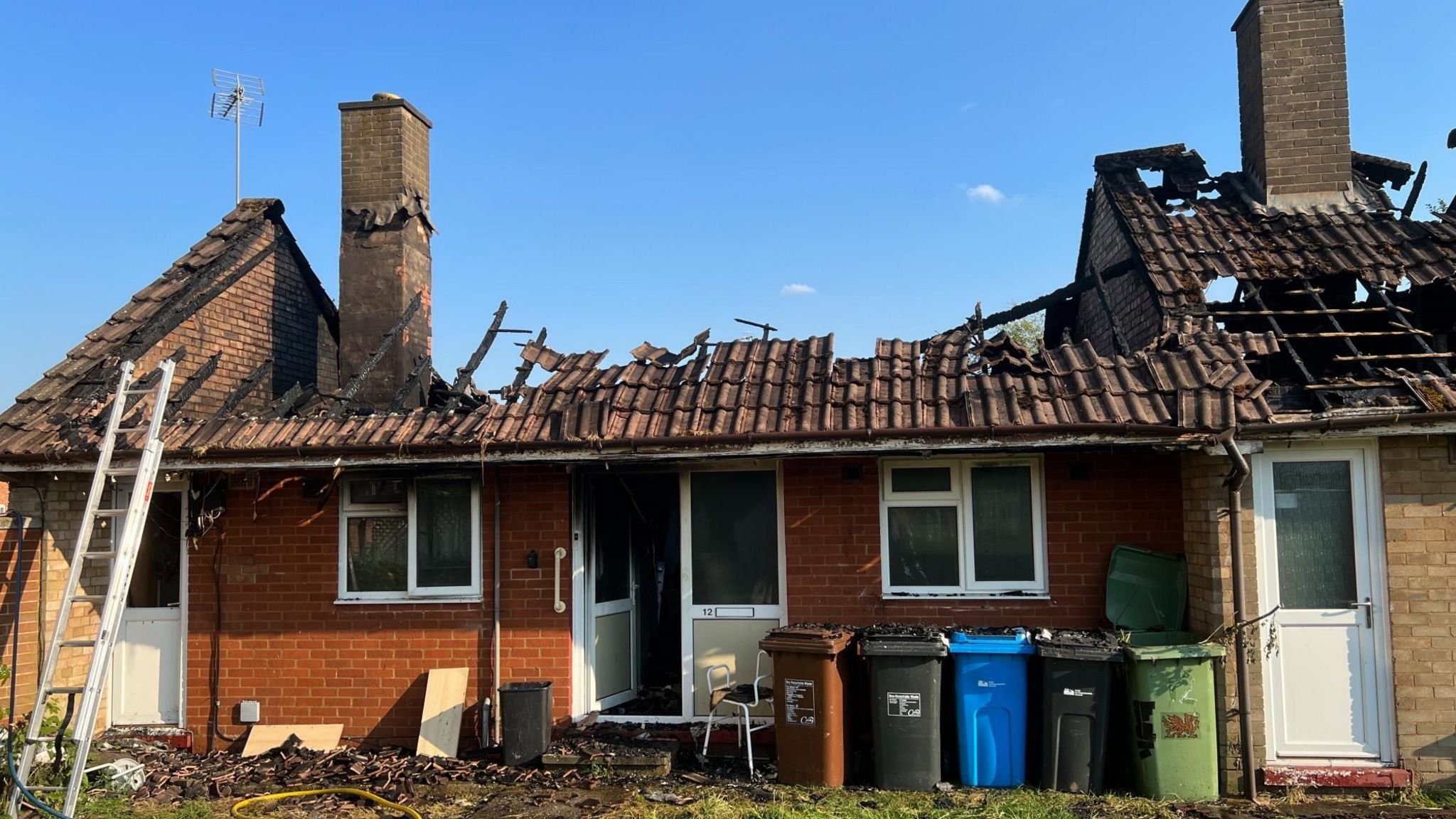 Harrogate Court in Corby with roofs destroyed by fire damage