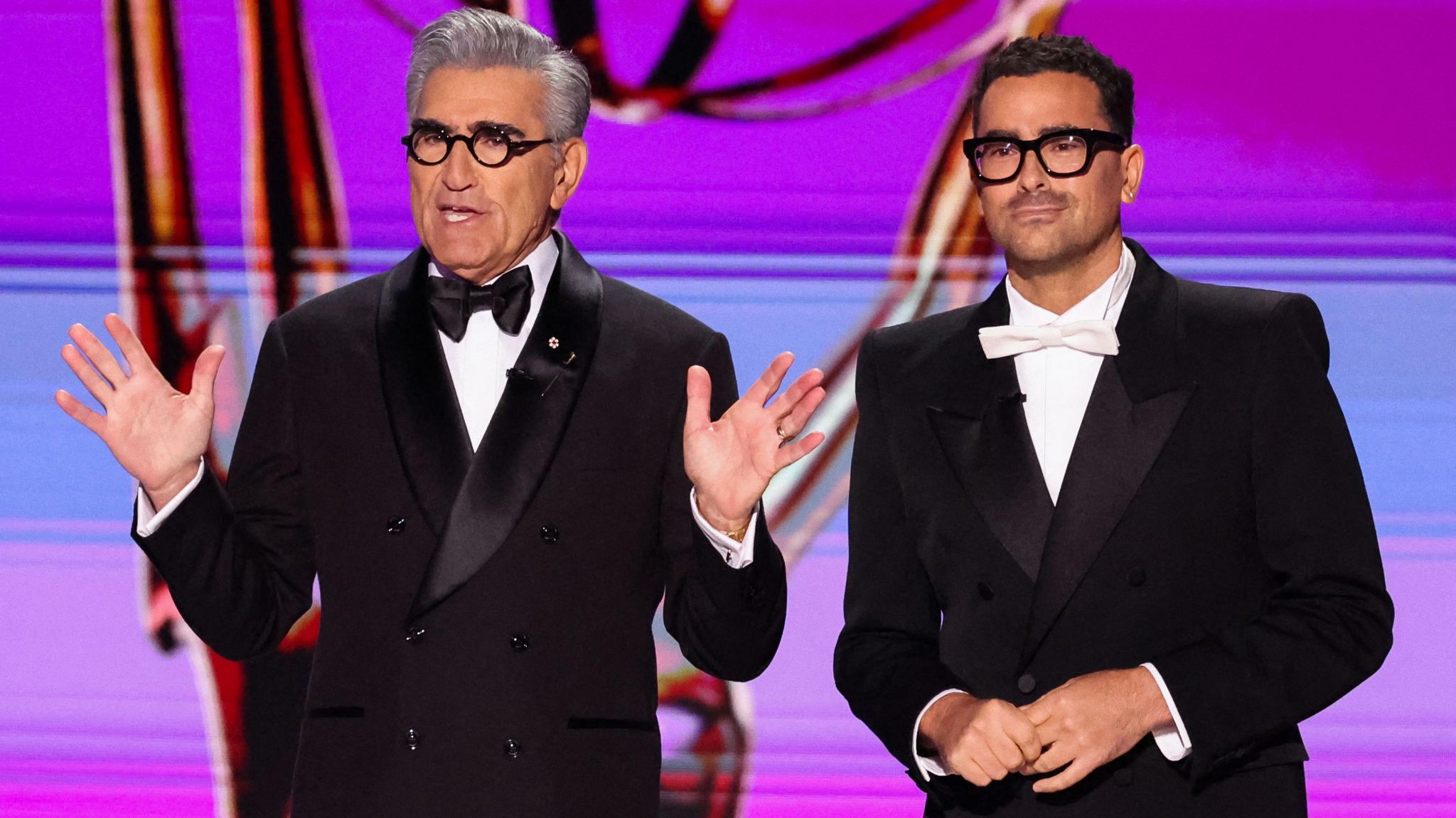 Eugene Levy and Dan Levy speak on stage at the 76th Primetime Emmy Awards in Los Angeles, California, U.S., September 15, 2024.