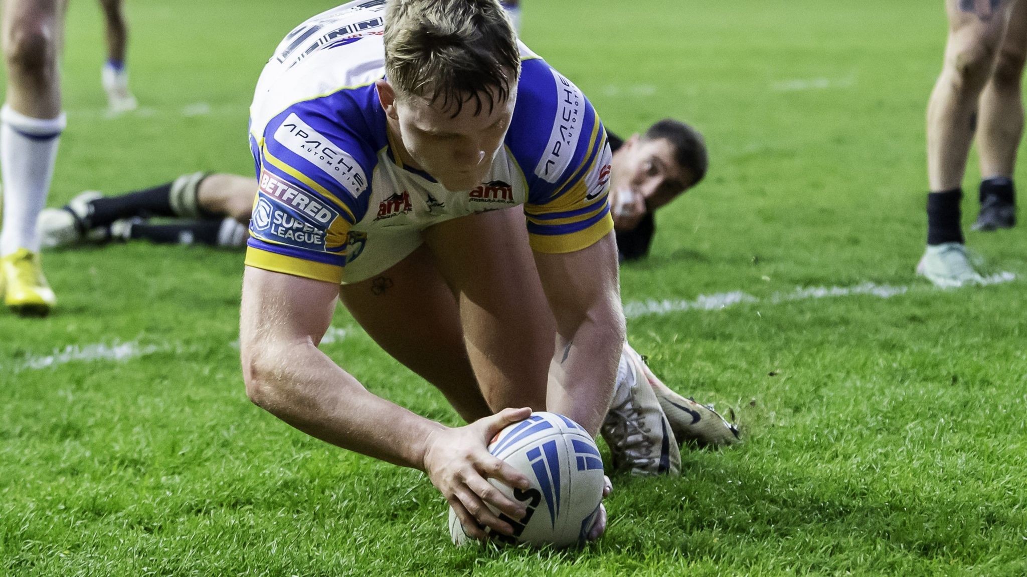 James McDonnell scores a try for Leeds against London Broncos
