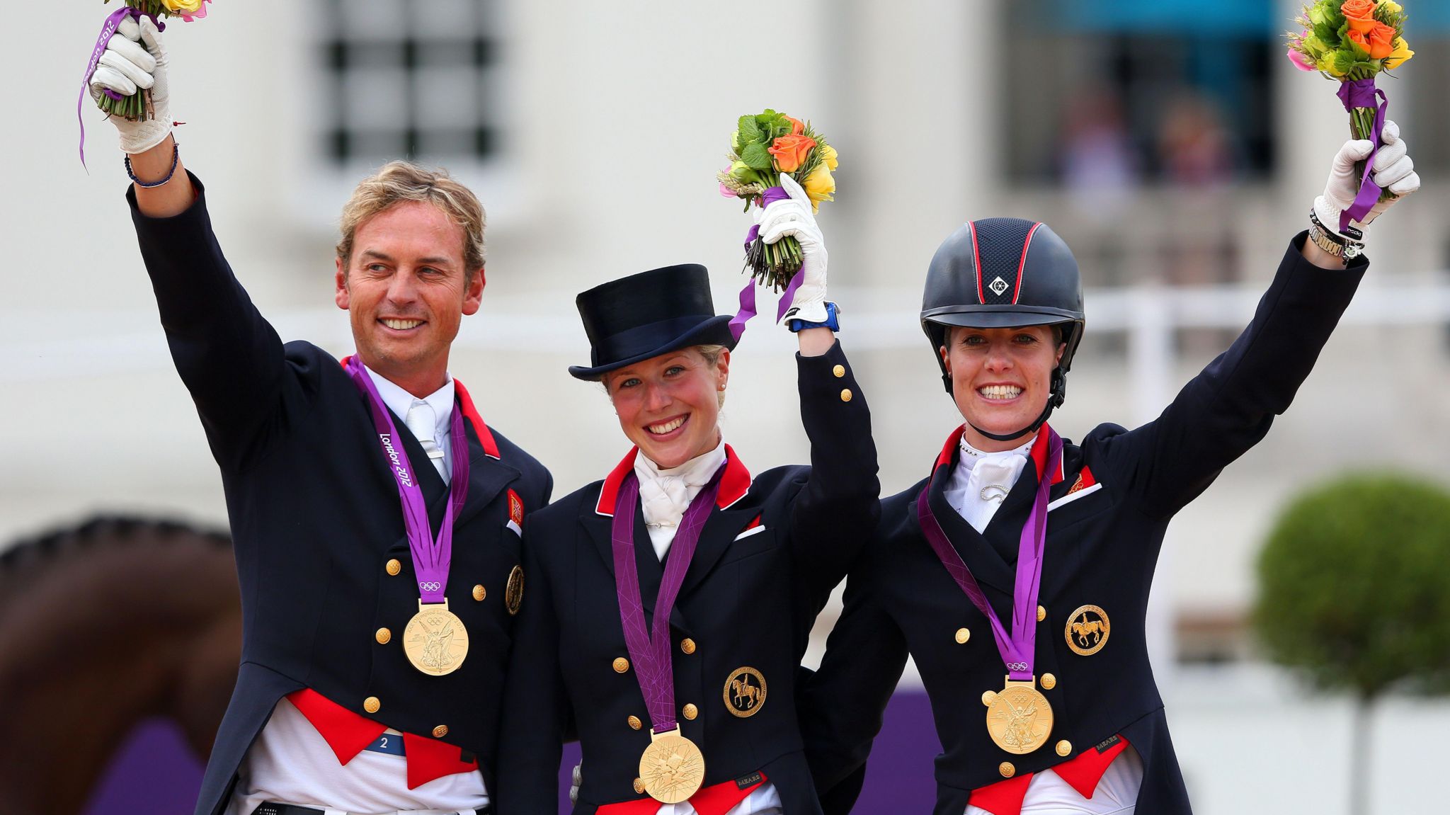 Carl Hester,  Charlotte Dujardin and Laura Bechtolsheimer celebrate winning Olympic gold in 2012
