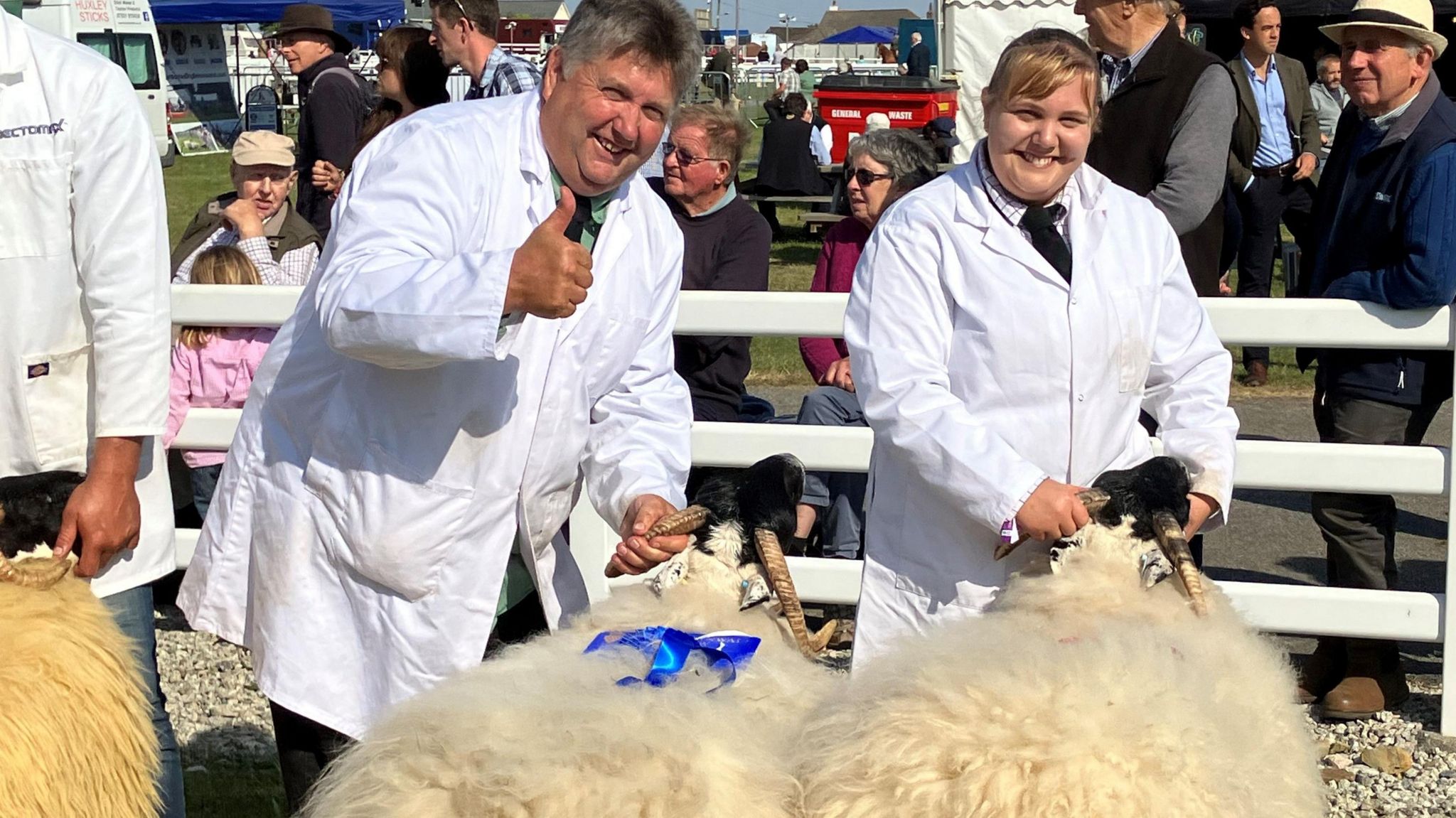 Father and daughter winning sheep show