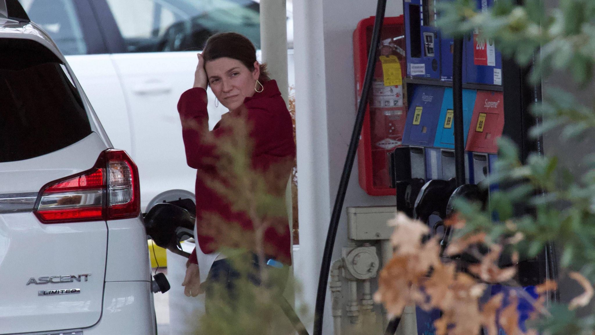Anne Sacoolas filling a car up with fuel