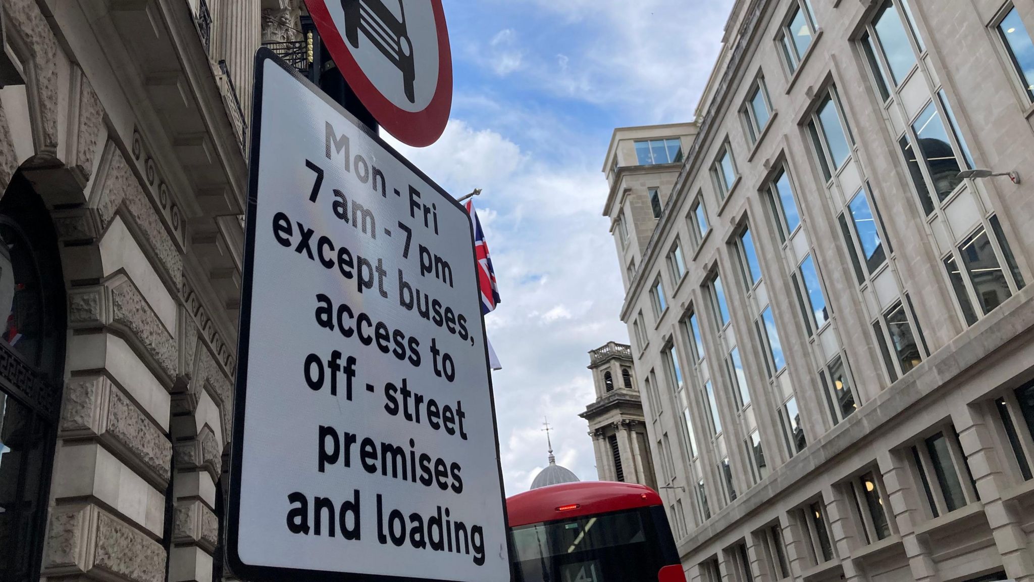 Road sign in Bank junction saying the restrictions 