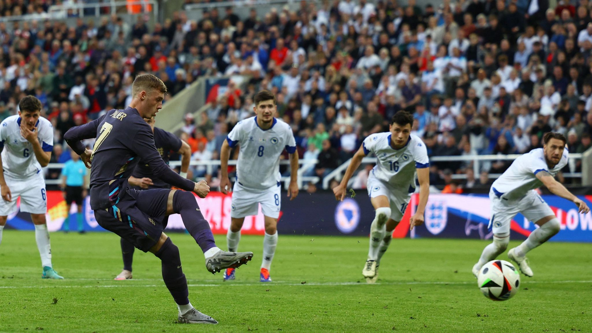 England's Cole Palmer scores their first goal from the penalty spot Action