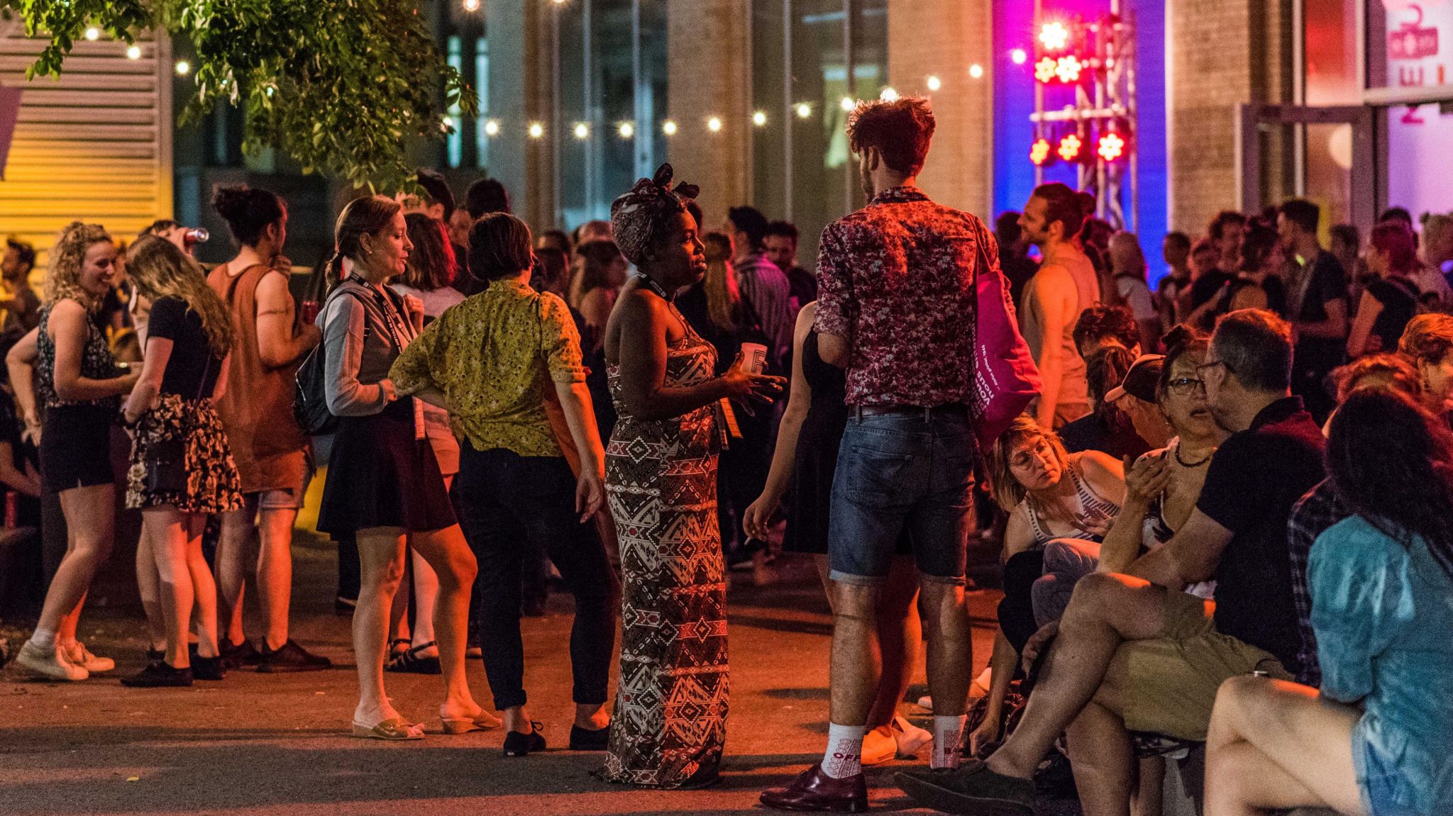 Young people in central Montreal on a warm evening in July