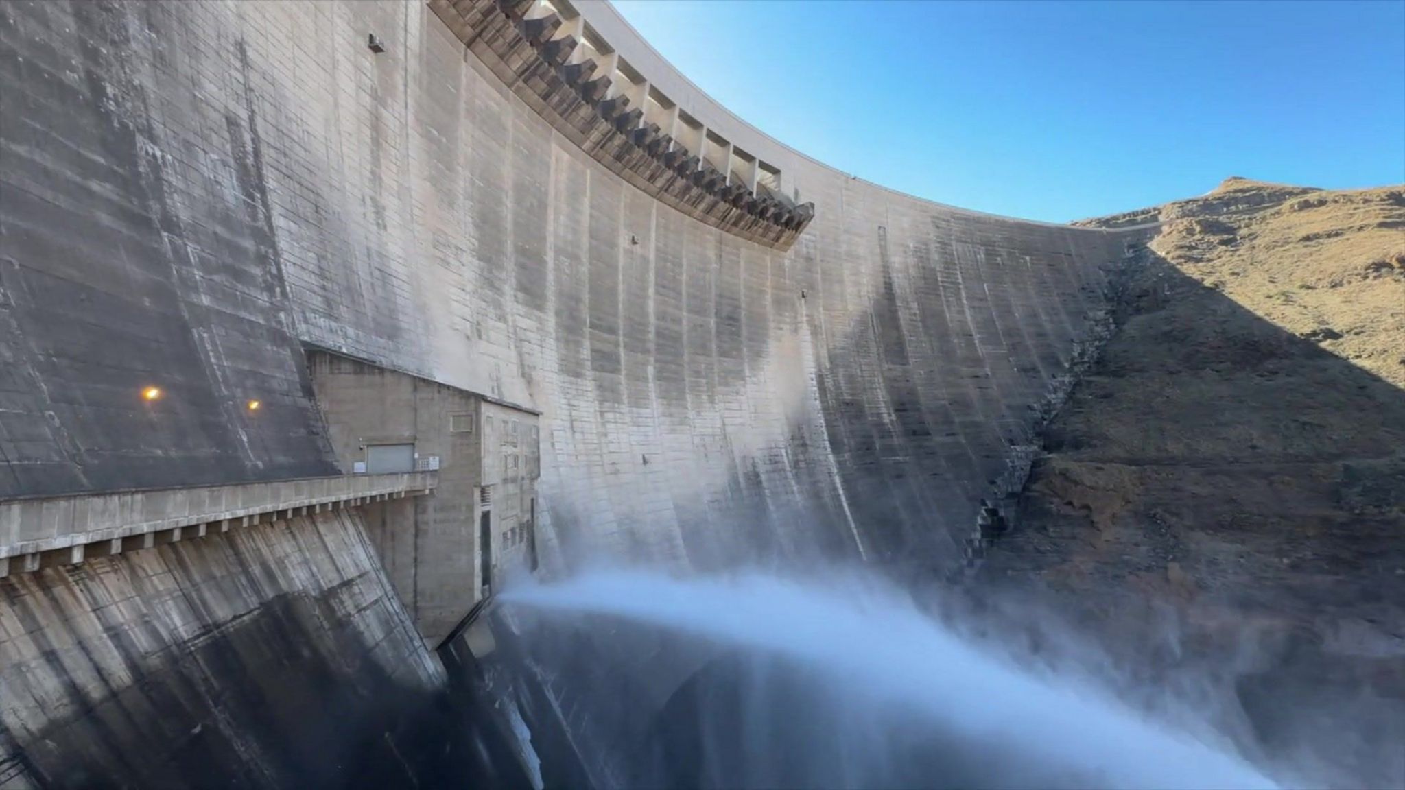 Dam with water gushing through it