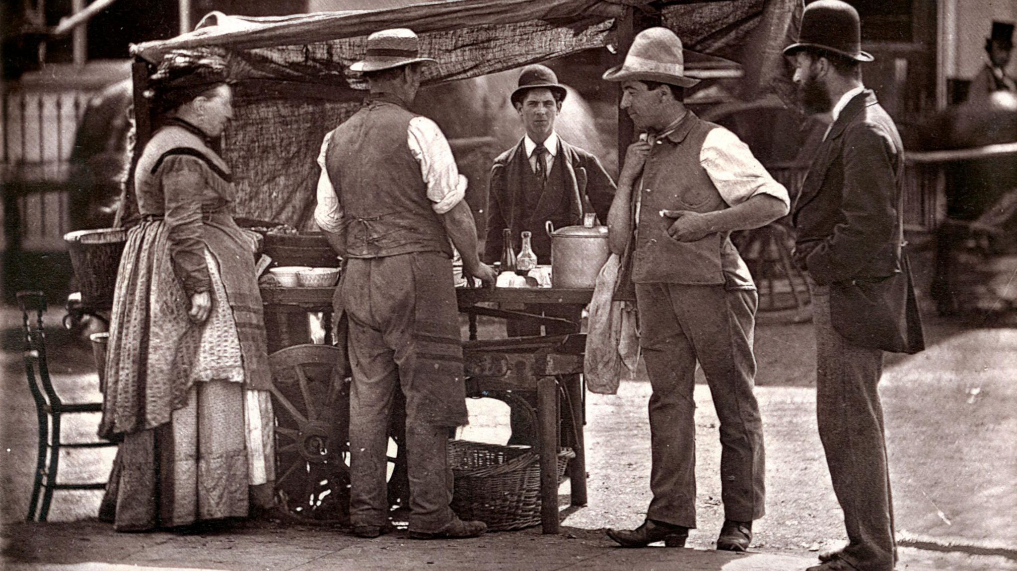 Stall selling shellfish in London, 1877