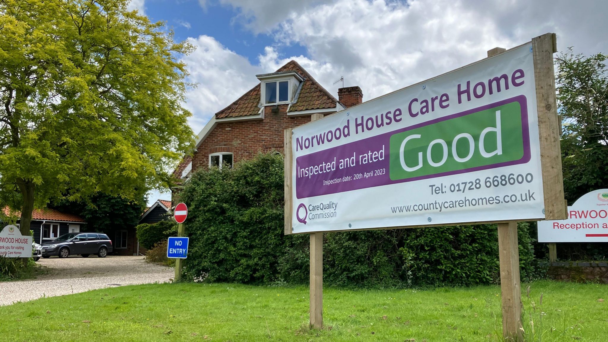 Sign outside Norwood House Care Home reading it has been rated as good by the CQC 