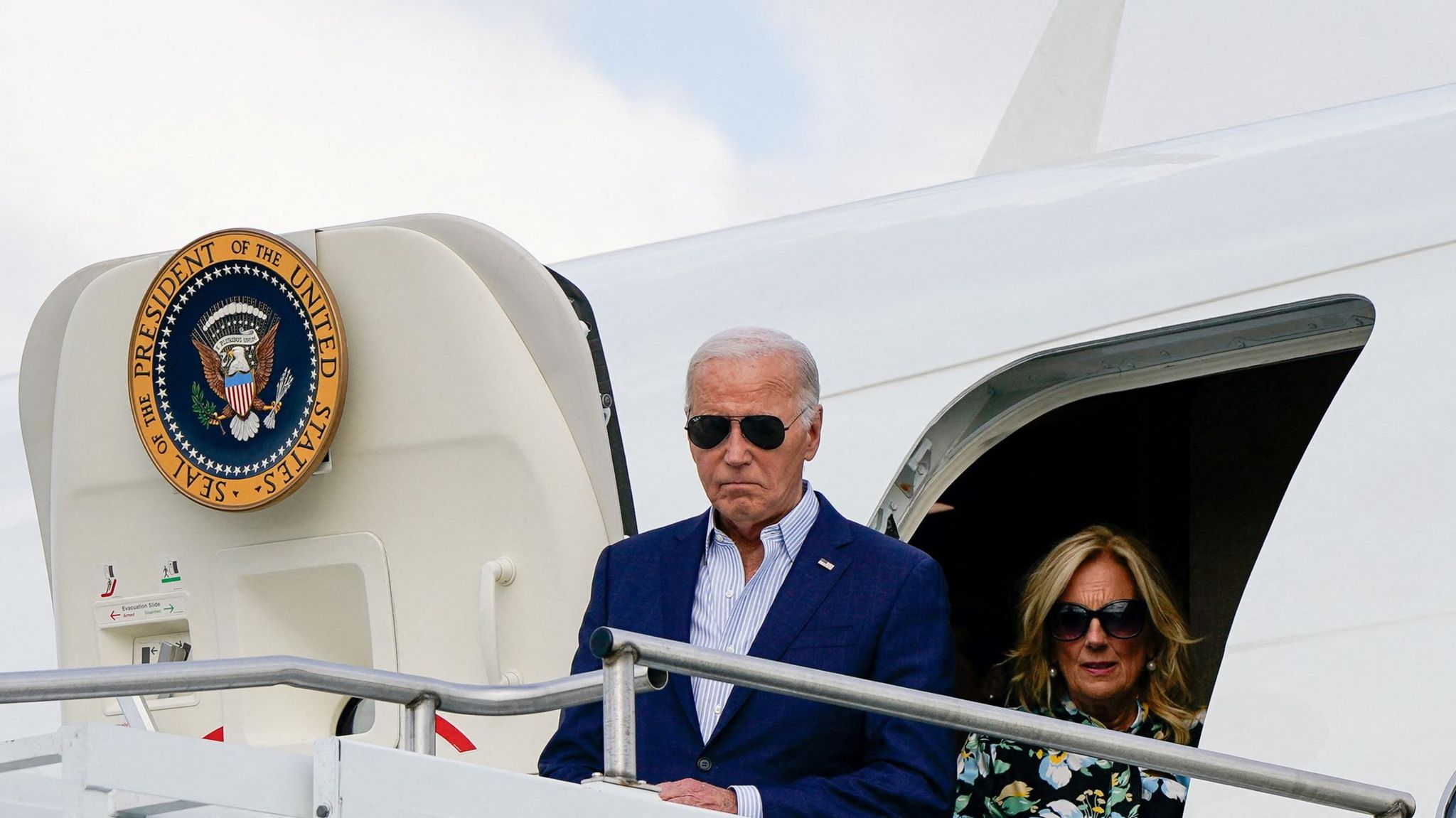 Biden and his wife Jill exiting Air Force One