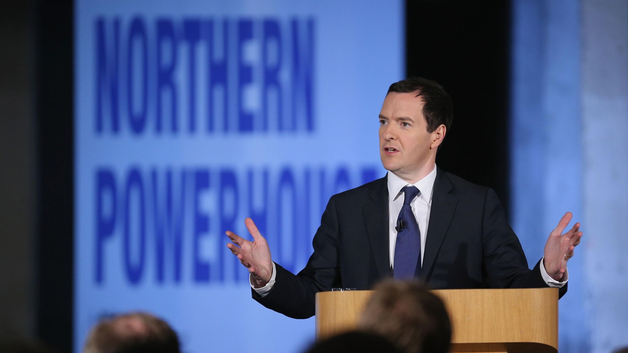 Former chancellor George Osborne standing behind a podium as he delivers a speech on the Northern Powerhouse in 2015