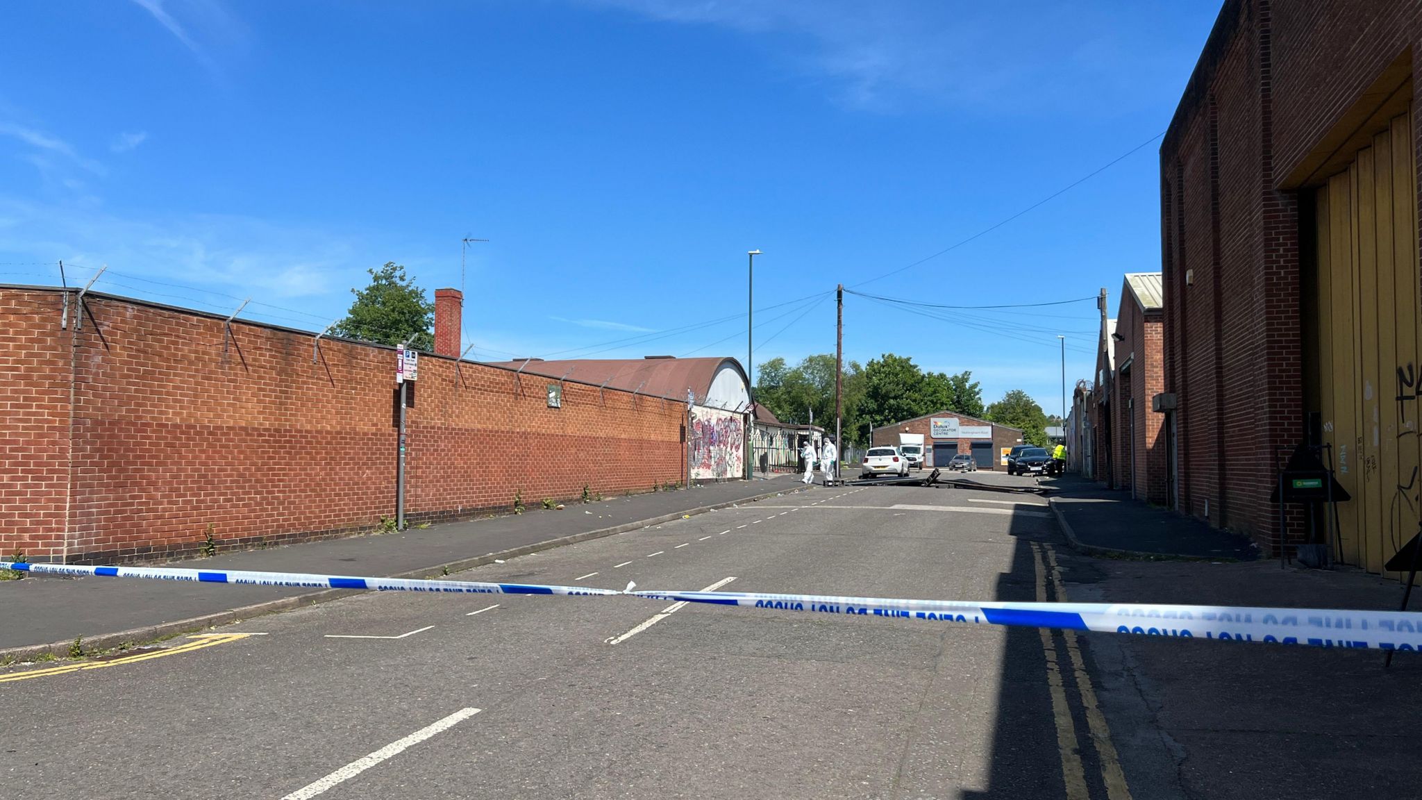 Police cordon and forensic officers in Roden Street, Nottingham