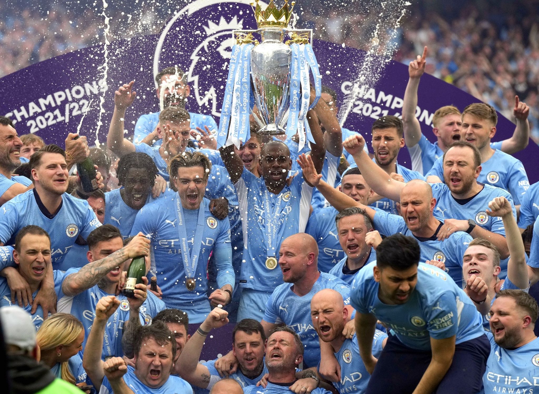 Manchester City's Oleksandr Zinchenko celebrates with the trophy