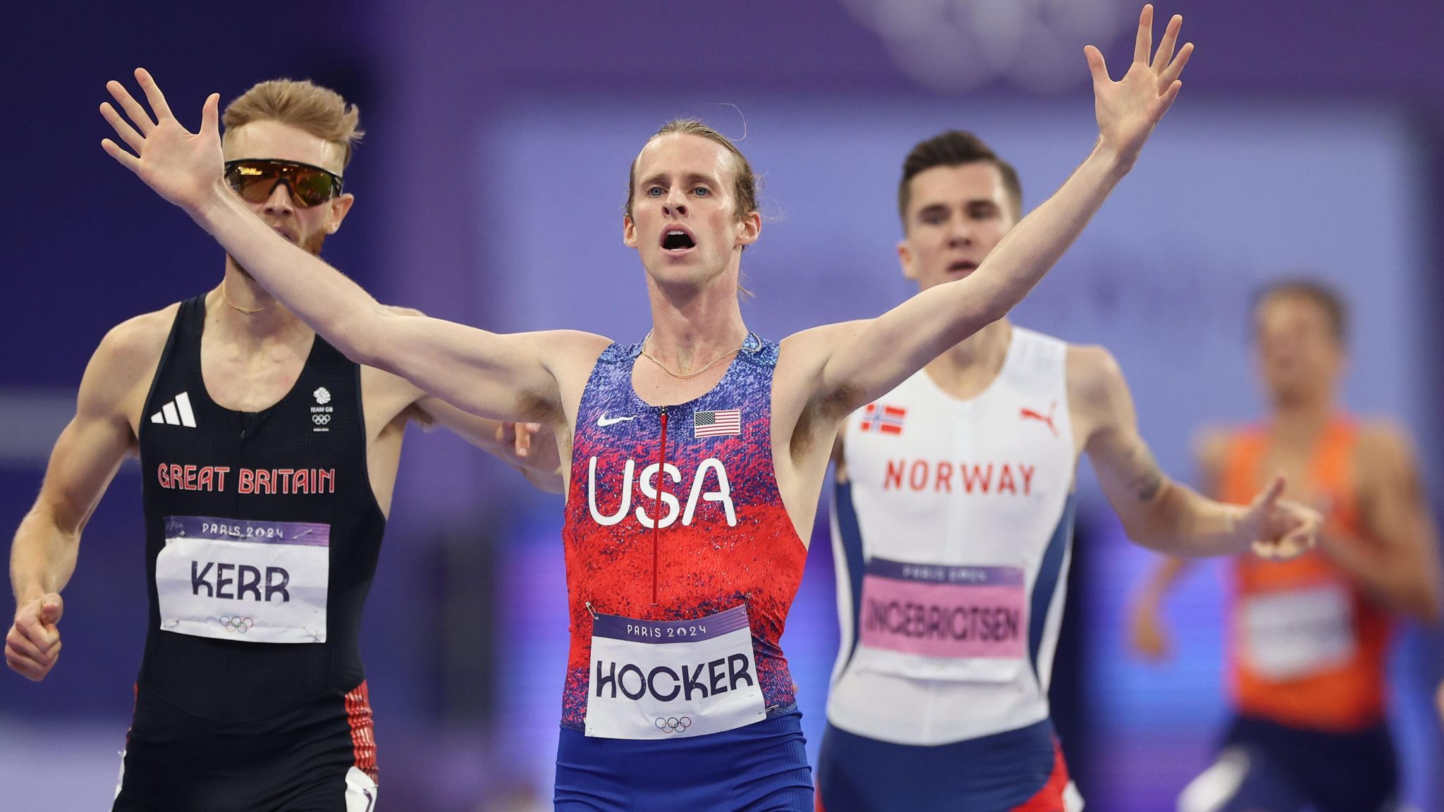 (L-R) Silver medalist Josh Kerr of Team Great Britain, gold medalist Cole Hocker of Team United States and Jakob Ingebrigtsen of Team Norway cross the finish line during the Men's 1500m Final on day eleven of the Olympic Games Paris 2024 