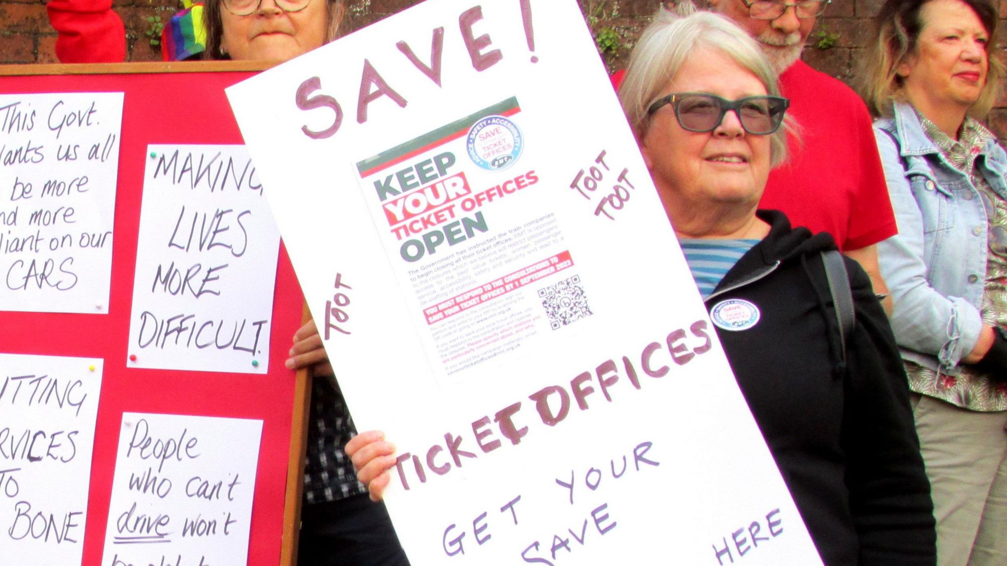 Tony Vaughn and Sue Wood taking part in a demonstration over bus services