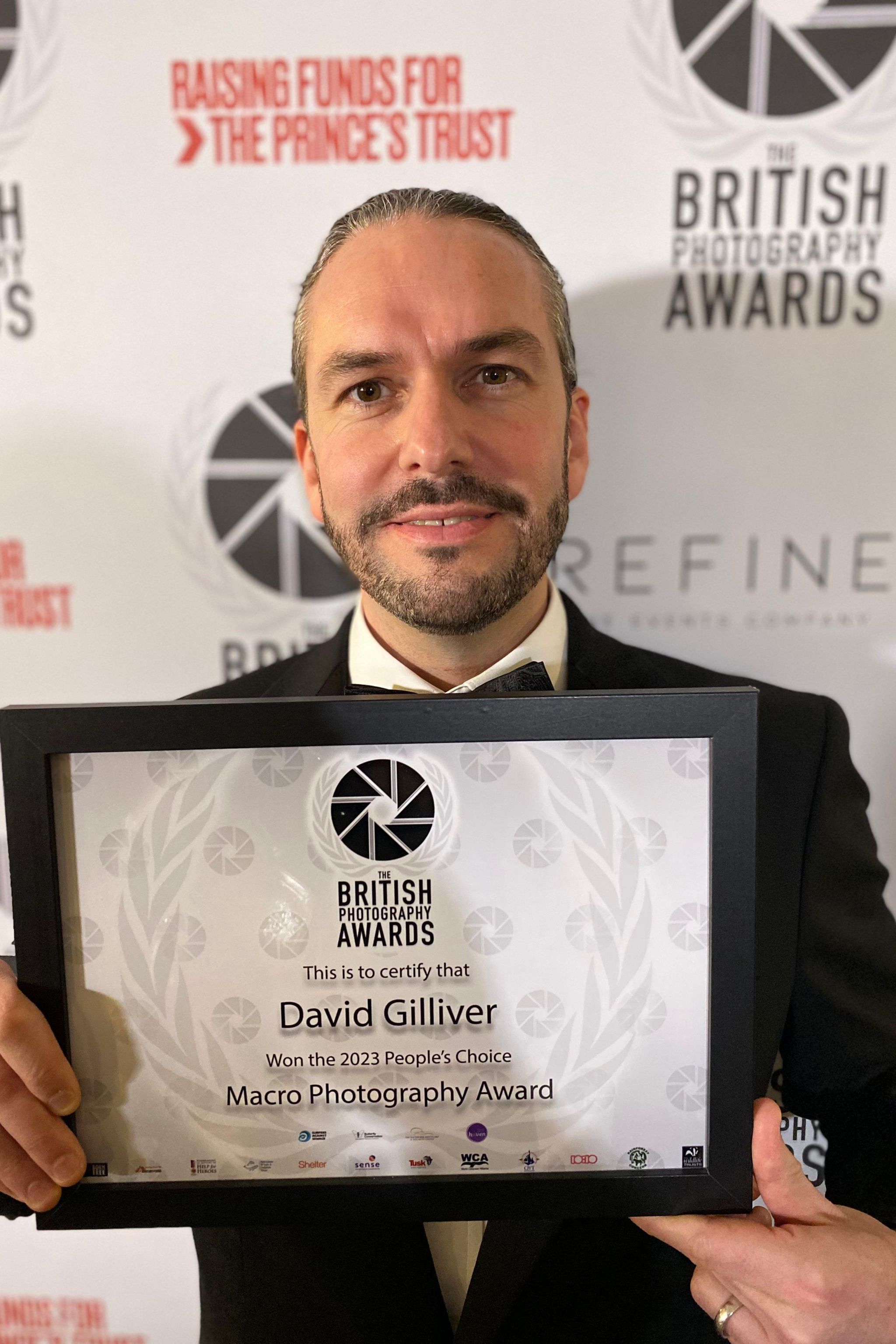 David Gilliver holding his award