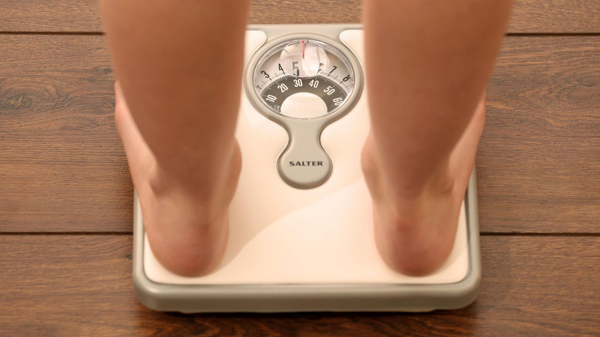 A person on weighing scales