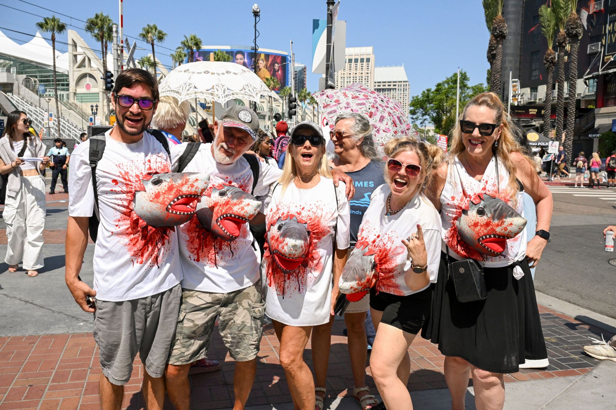 Fans of the film series Sharknado pose in their costumes 