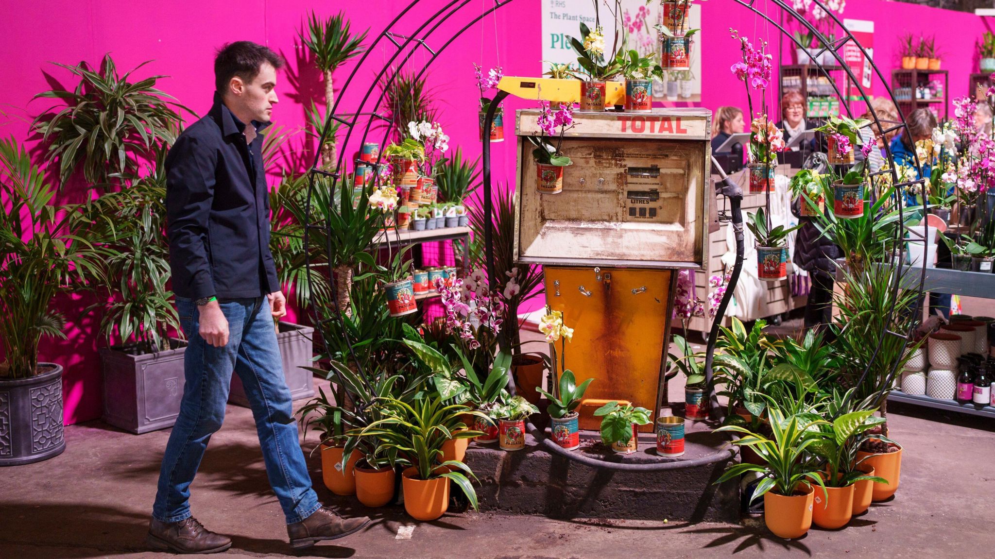 A man walks past an exhibit at the RHS Urban show in Manchester