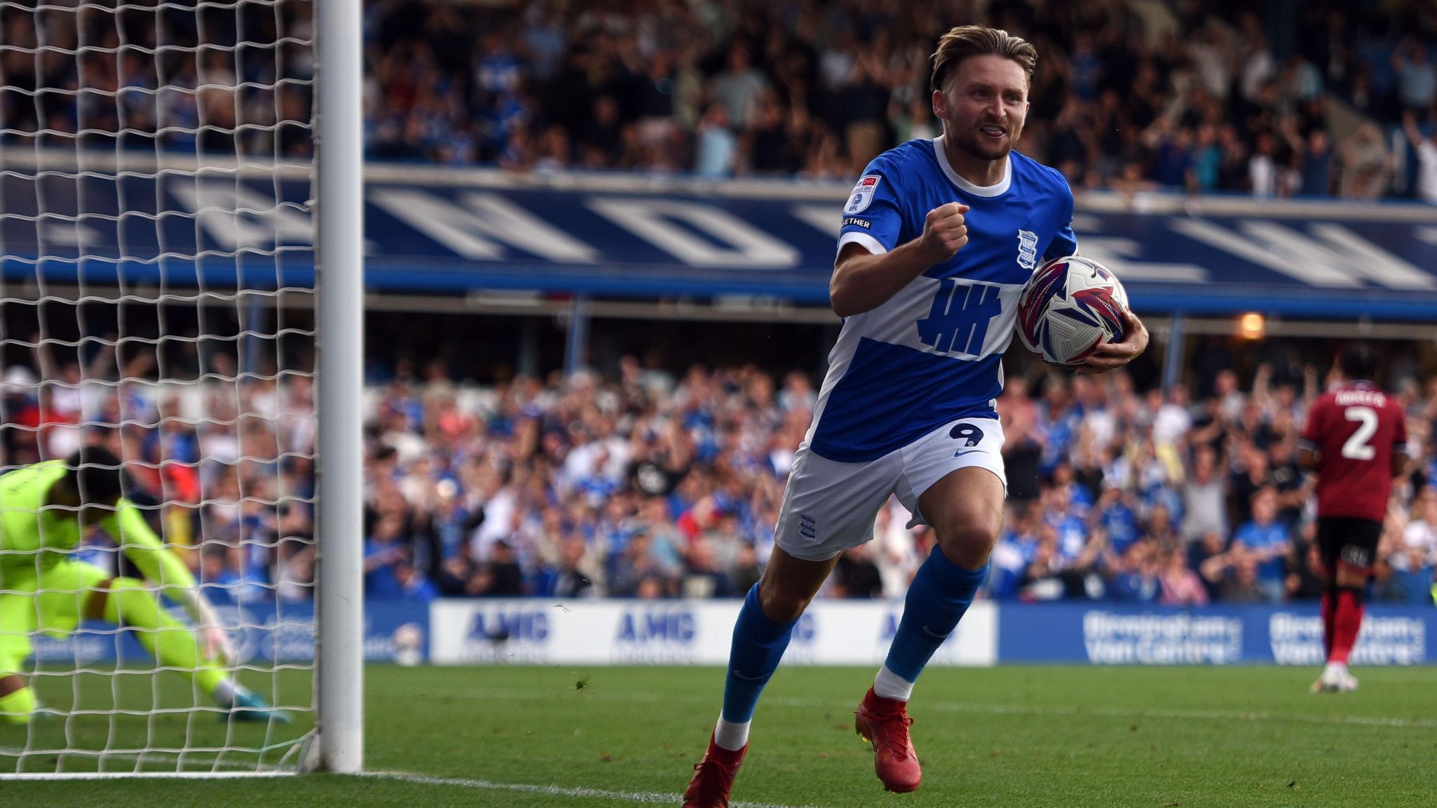 Alfie May celebrates