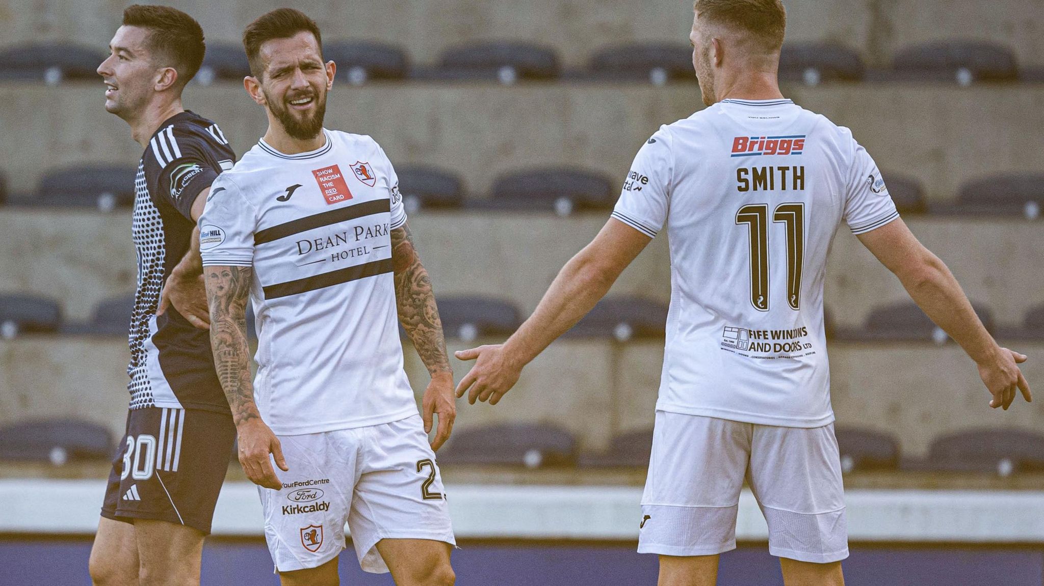 Raith Rovers' Dylan Easton (centre) is left disappointed