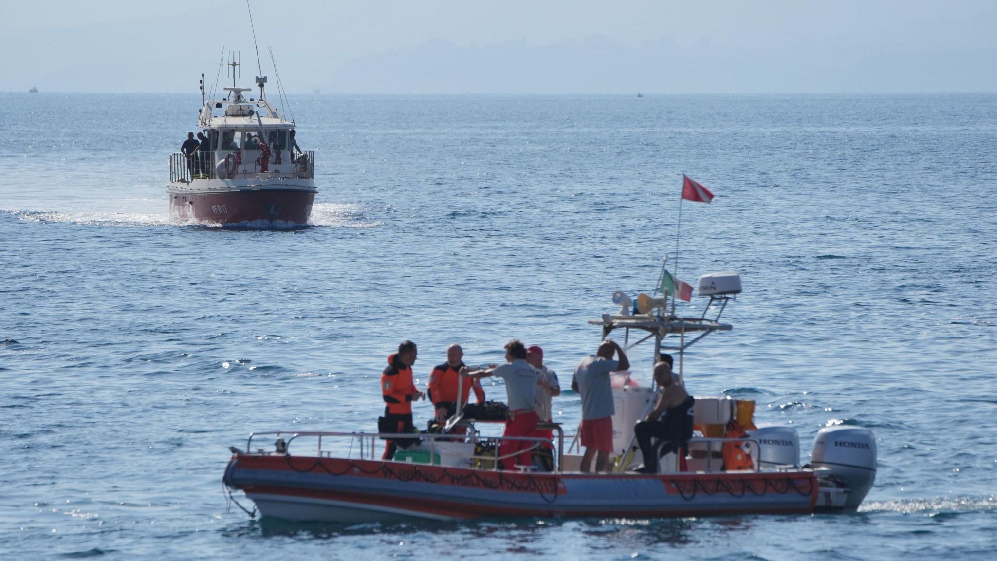 Rescue boats on the water on the fifth day of the search and recovery operation after the luxury yacht Bayesian sank in a storm on Monday