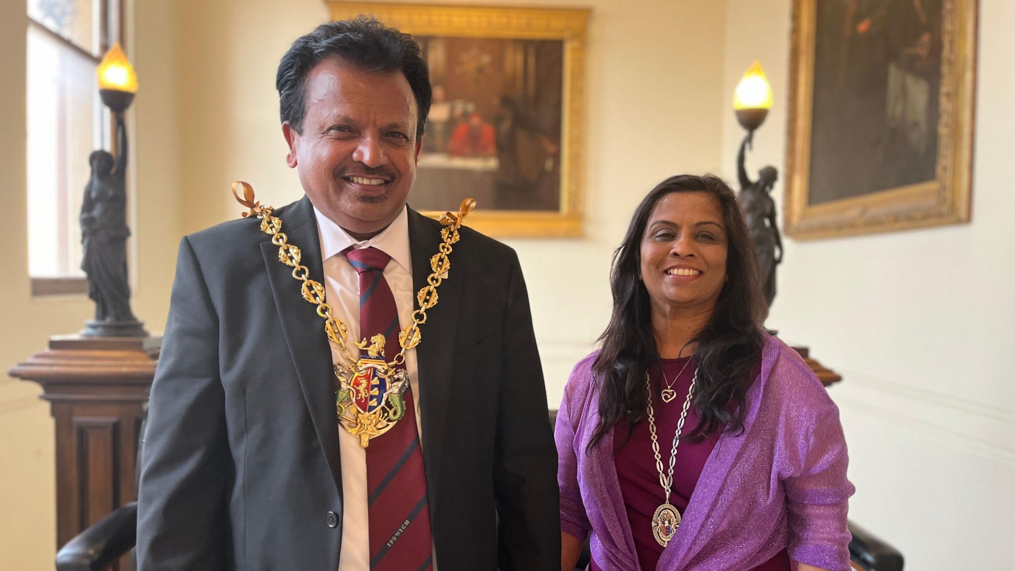 Elango and Manchula Elavalakan wearing civic medals, smiling