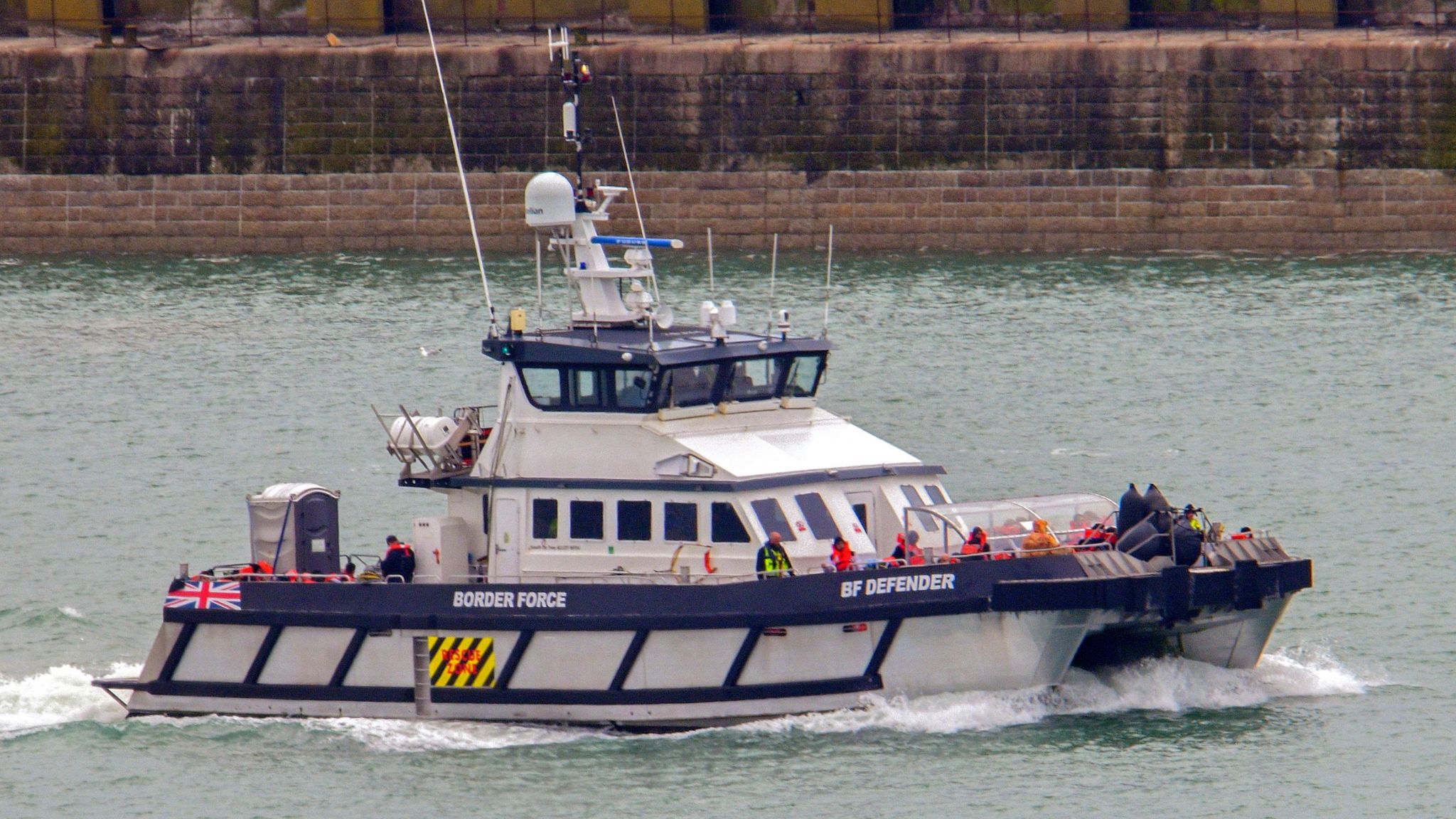 A border force boat with people on it