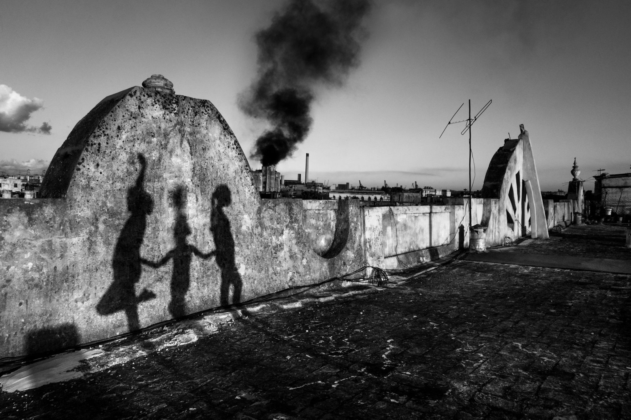 The shadows of children on a wall in Havana, Cuba