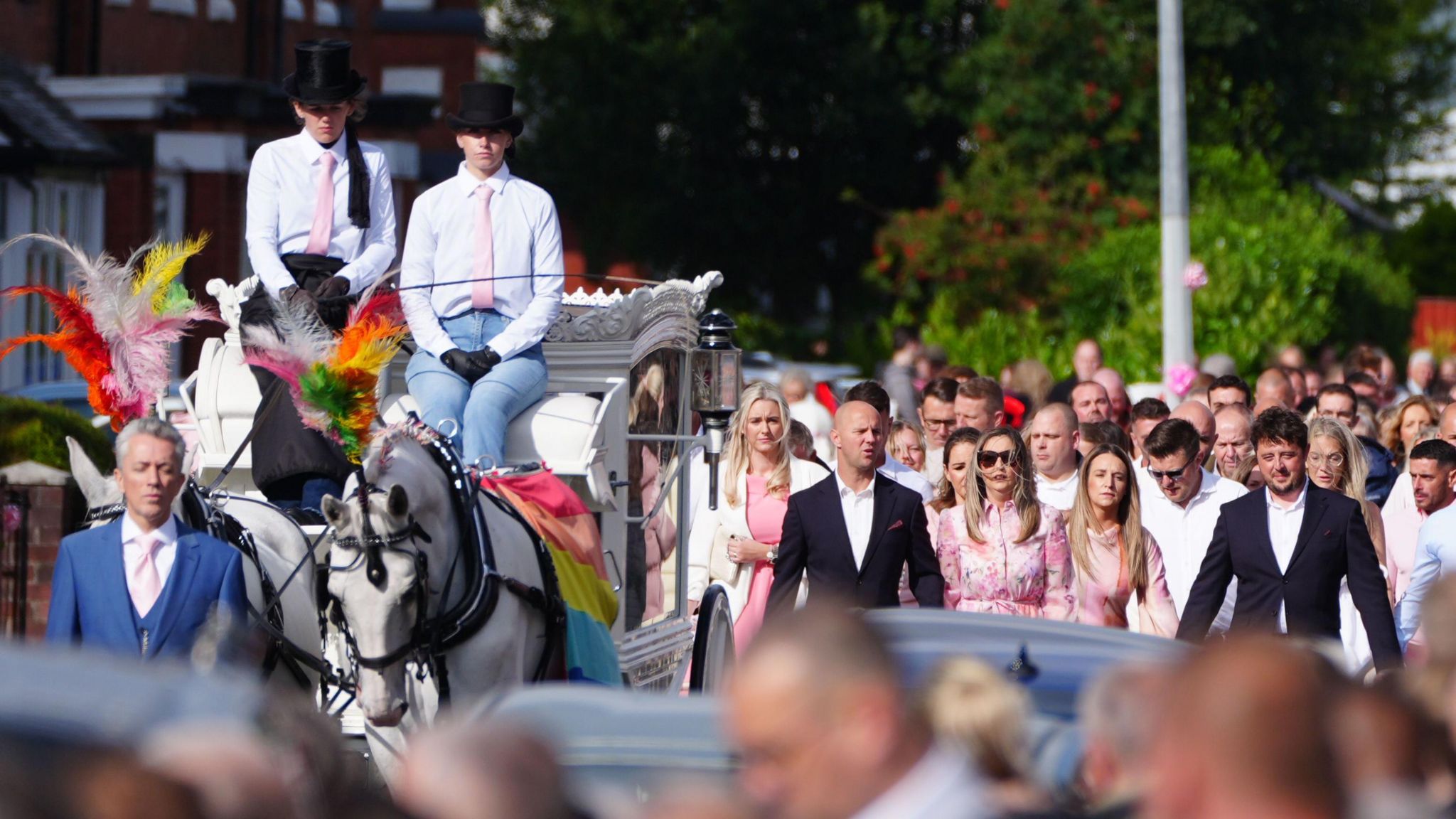 Mourners walk behind the horse-drawn carriage carrying the coffin of Southport stabbing victim Elsie Dot Stancombe, as the cortege travels to her funeral at St John's Church in Birkdale