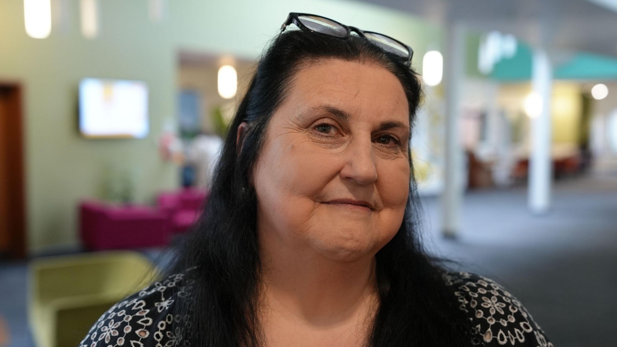 Lynda Brown in a Marie Curie Hospice. She is in focus and the background is blurred.