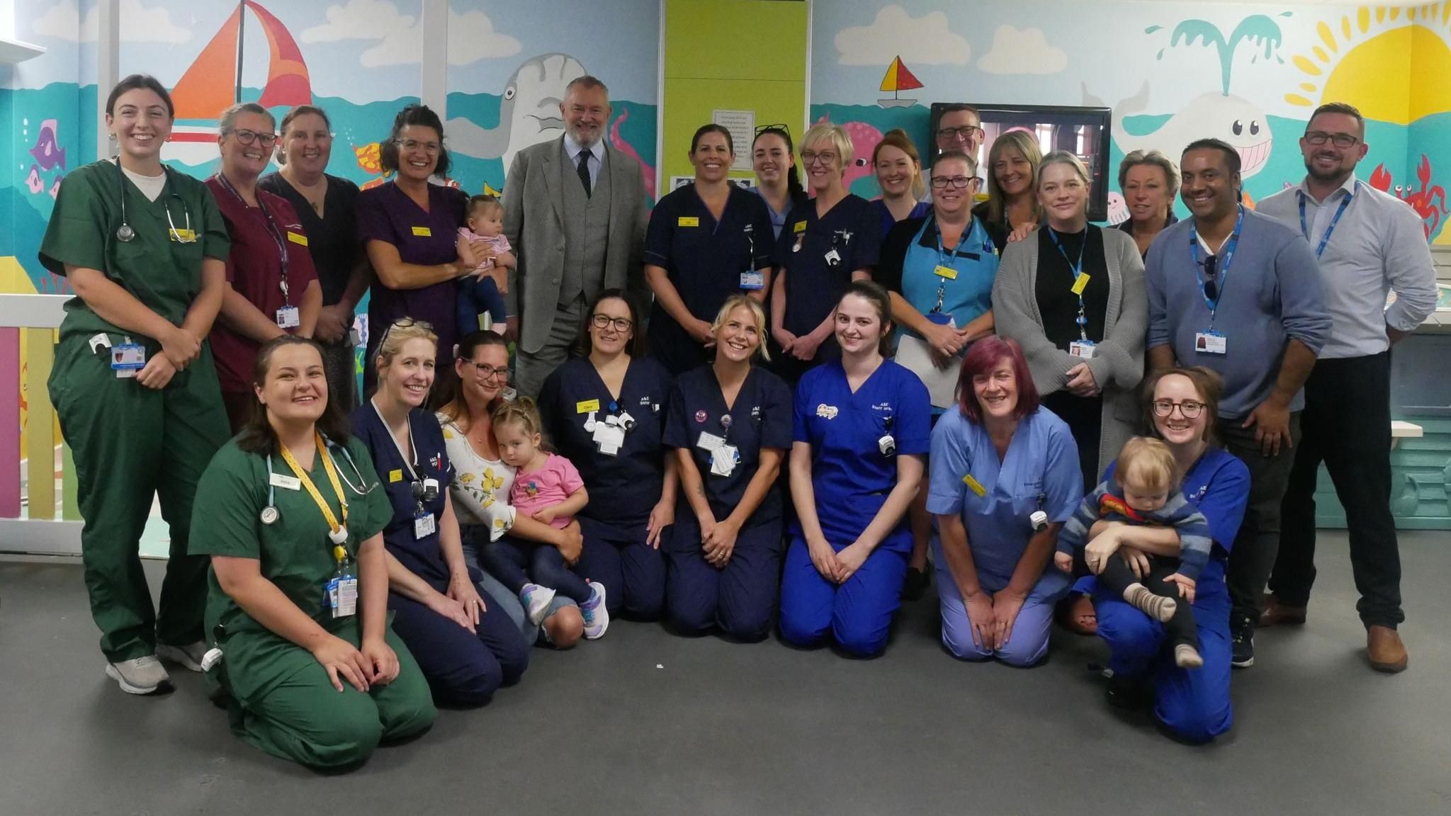 Hugh Bonneville and staff at St Richard’s Hospital in Chichester 