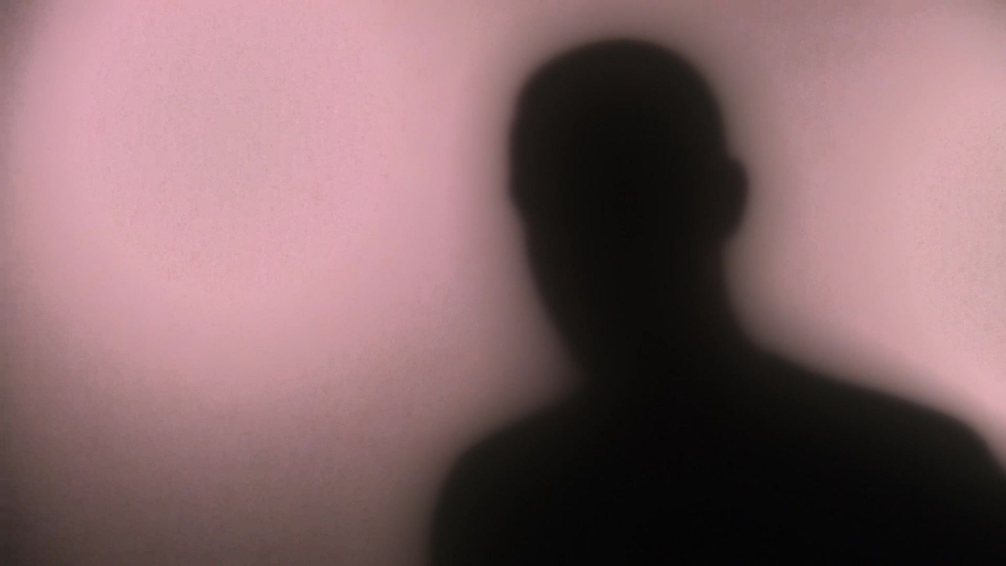 A blurred out silhouette of a man 