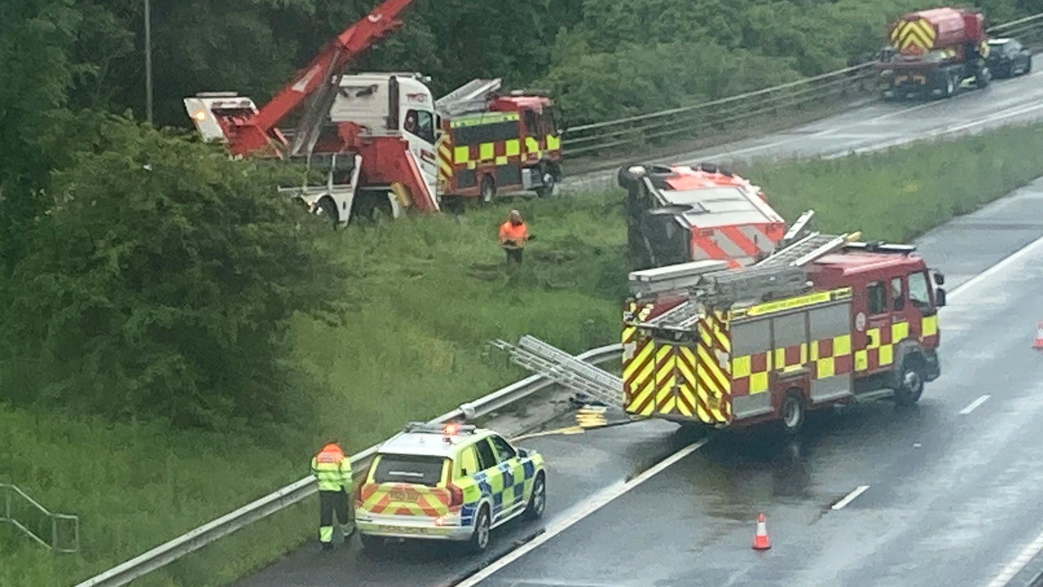 Fire engine being recovered after incident on M65
