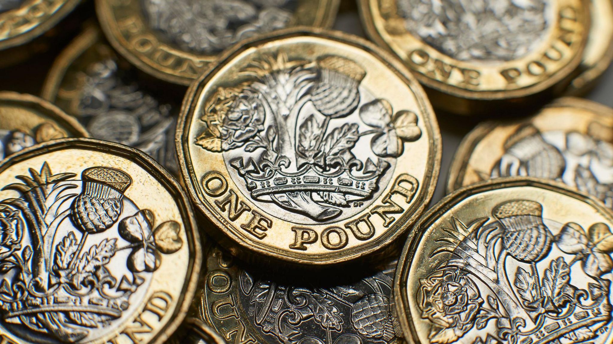 A pile of GBP £1 coins