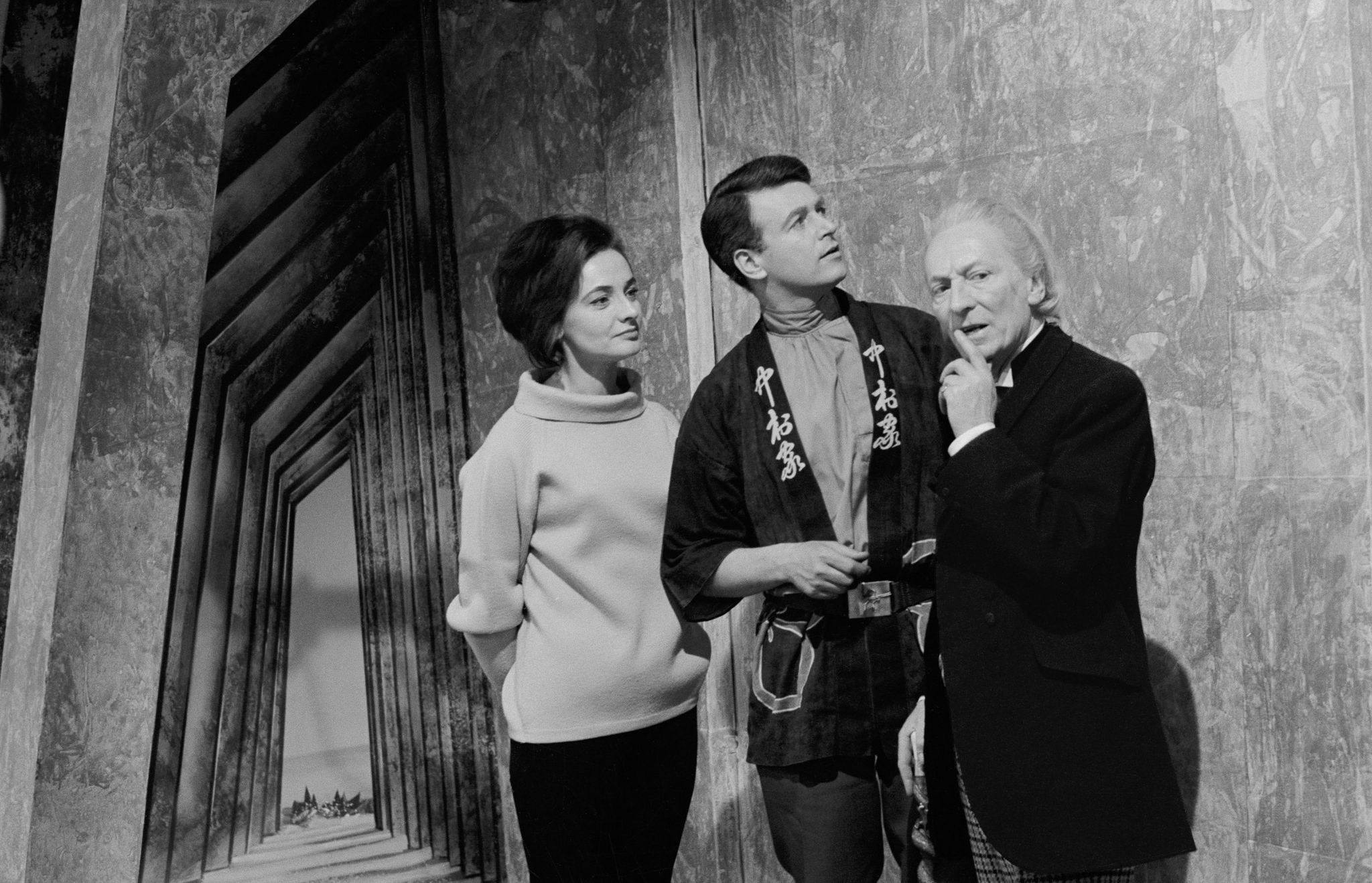 Jacqueline Hill (Barbara Wright), William Russell (Ian) and William Hartnell (The Doctor) explore the mysterious tower in The Keys of Marinus (1963)