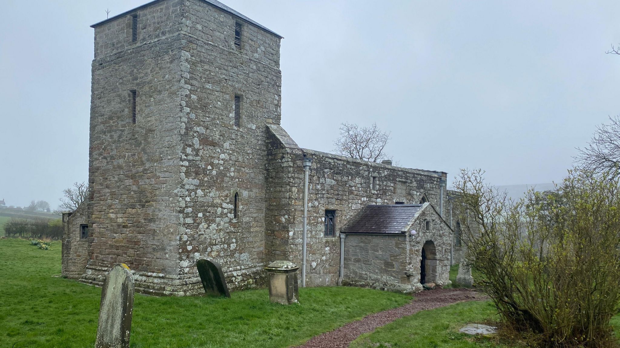 An 11th century small church with a squat Norman tower