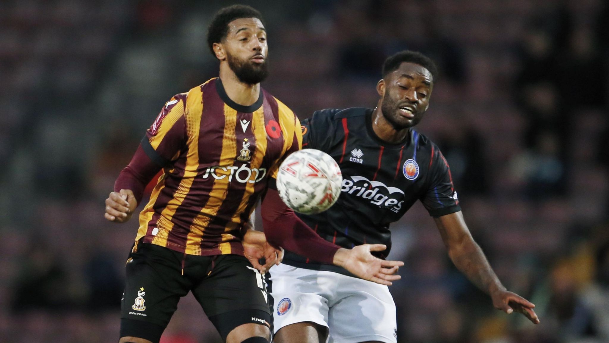 Bradford City's Vadaine Oliver chests the ball down under pressure against Aldershot at the University of Bradford Stadium