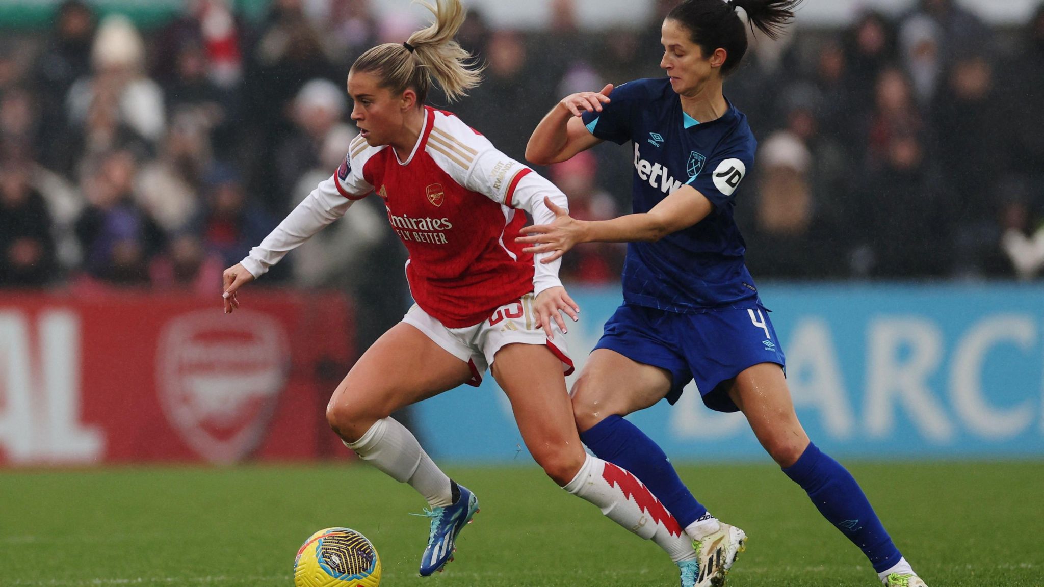 Arsenal's Alessia Russo in action with West Ham United's Abbey-Leigh Stringer